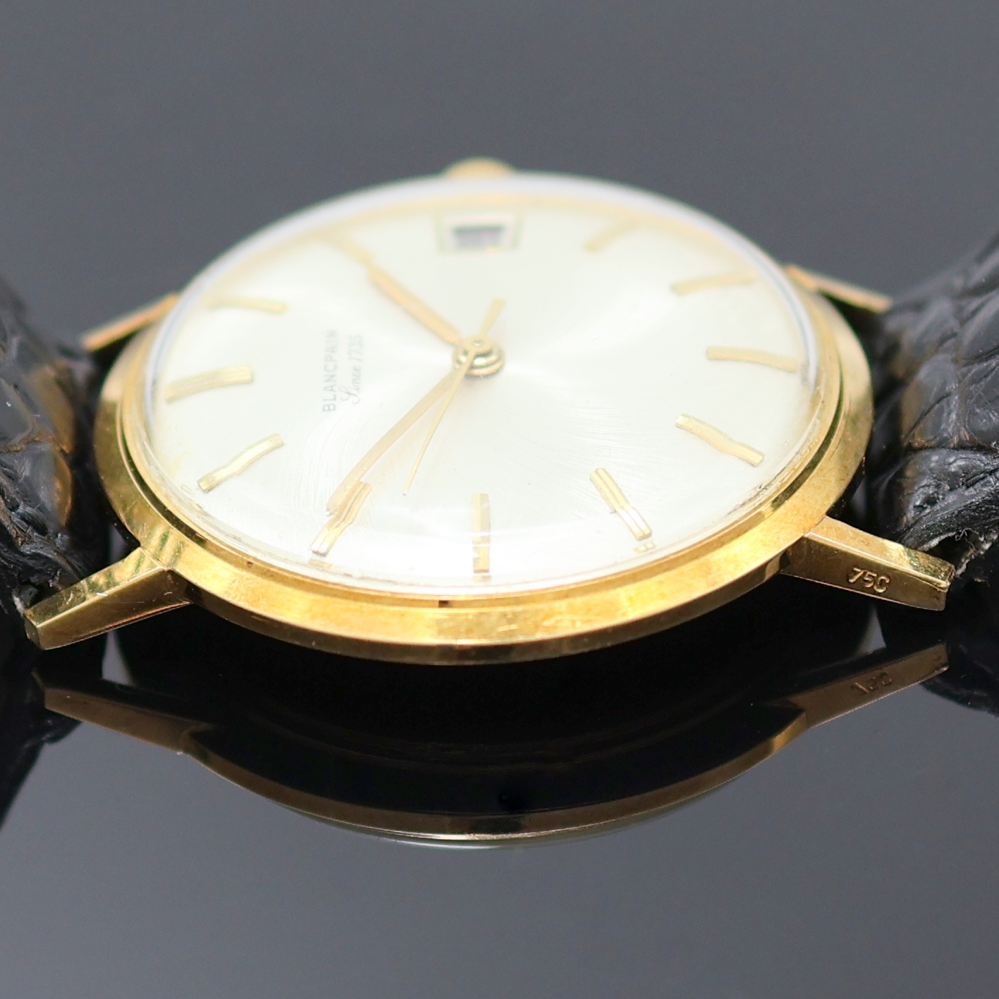 Detail e: BLANCPAIN Armbanduhr in GG 750/000, Schweiz um 1970, Automatik, Monocoque-Geh., silb. Zifferbl. m. aufges. gold. Std.-Ind., gold. Zeiger, Datum b. 3, ...