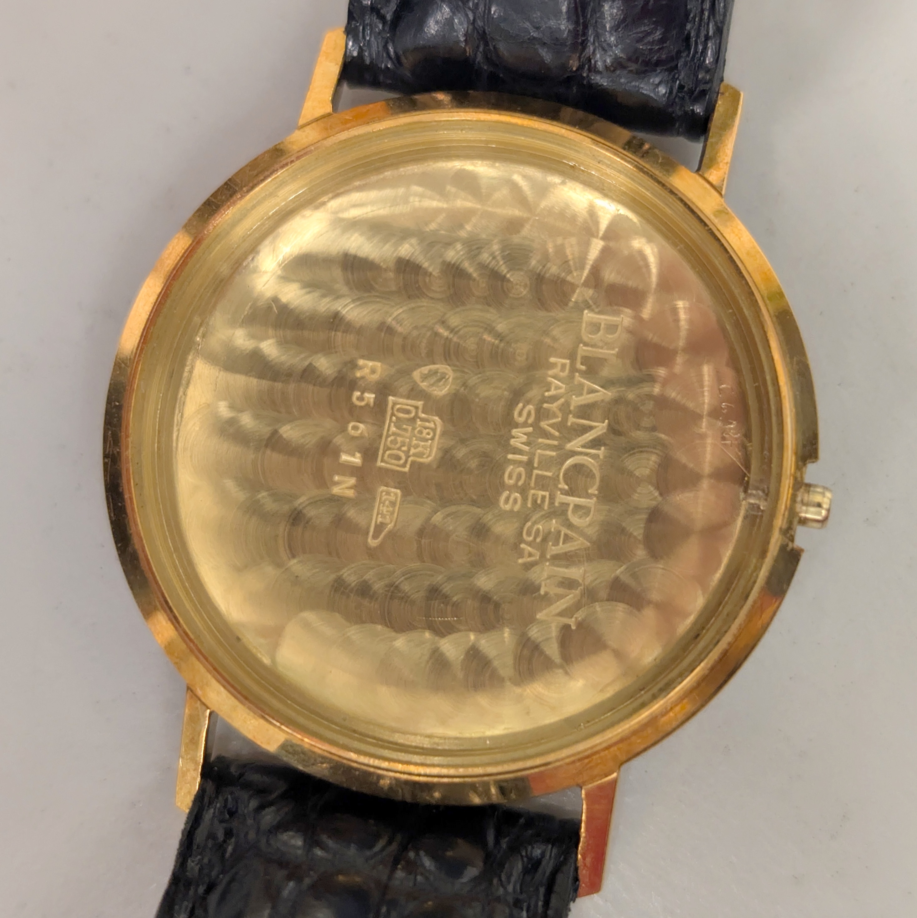 Detail i: BLANCPAIN Armbanduhr in GG 750/000, Schweiz um 1970, Automatik, Monocoque-Geh., silb. Zifferbl. m. aufges. gold. Std.-Ind., gold. Zeiger, Datum b. 3, ...