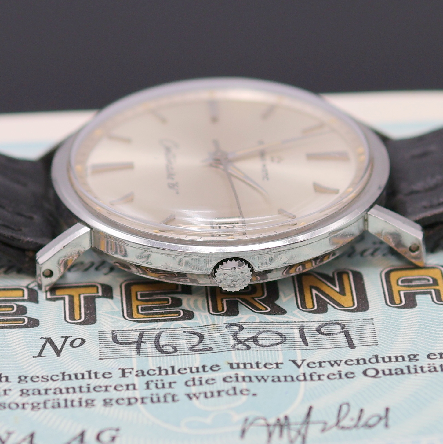 Detail e: ETERNA-MATIC Armbanduhr Centenaire 61, Automatik, Edelstahlgeh. inkl. Lederband m. orig. Dornschl., Boden verschr., Krone zum Schutz seitl. ...