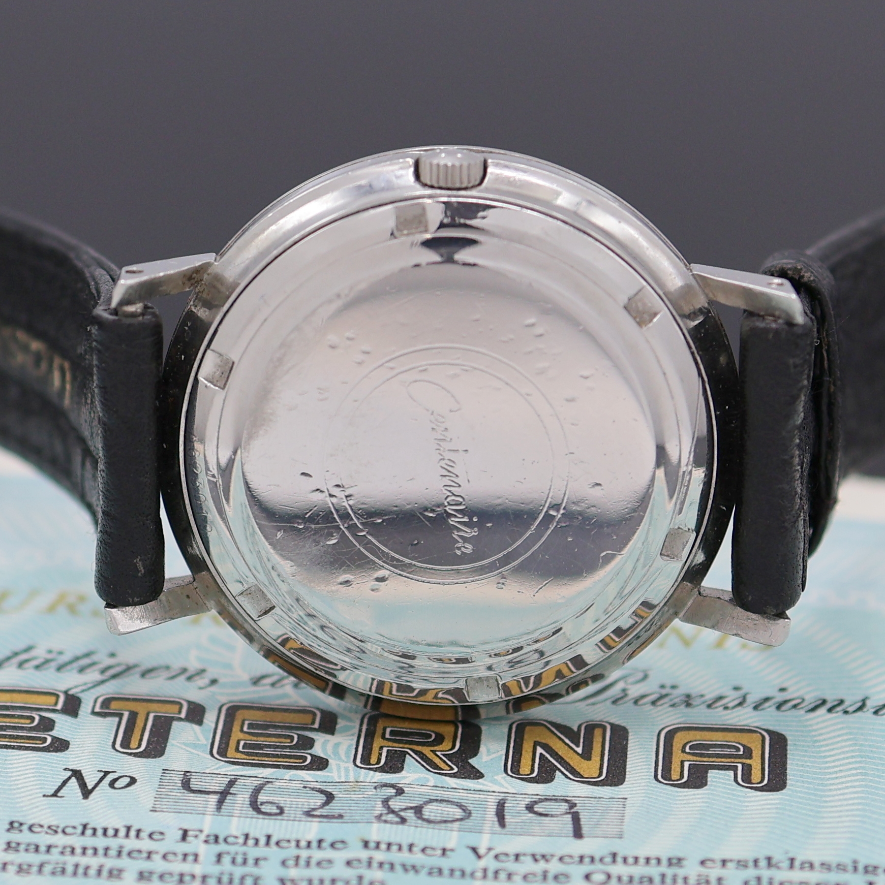 Detail g: ETERNA-MATIC Armbanduhr Centenaire 61, Automatik, Edelstahlgeh. inkl. Lederband m. orig. Dornschl., Boden verschr., Krone zum Schutz seitl. ...