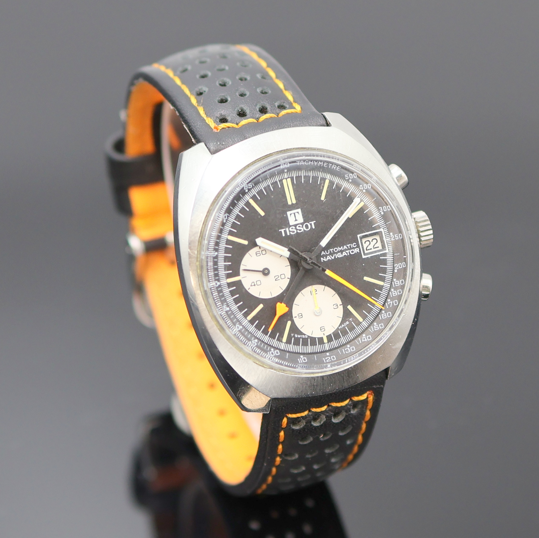 Detail b: TISSOT Navigator Armbandchronograph in Stahl Referenz 45 501, Schweiz um 1975, Automatik, Boden verschr., schwarzes Zifferbl. m. Tritium ...