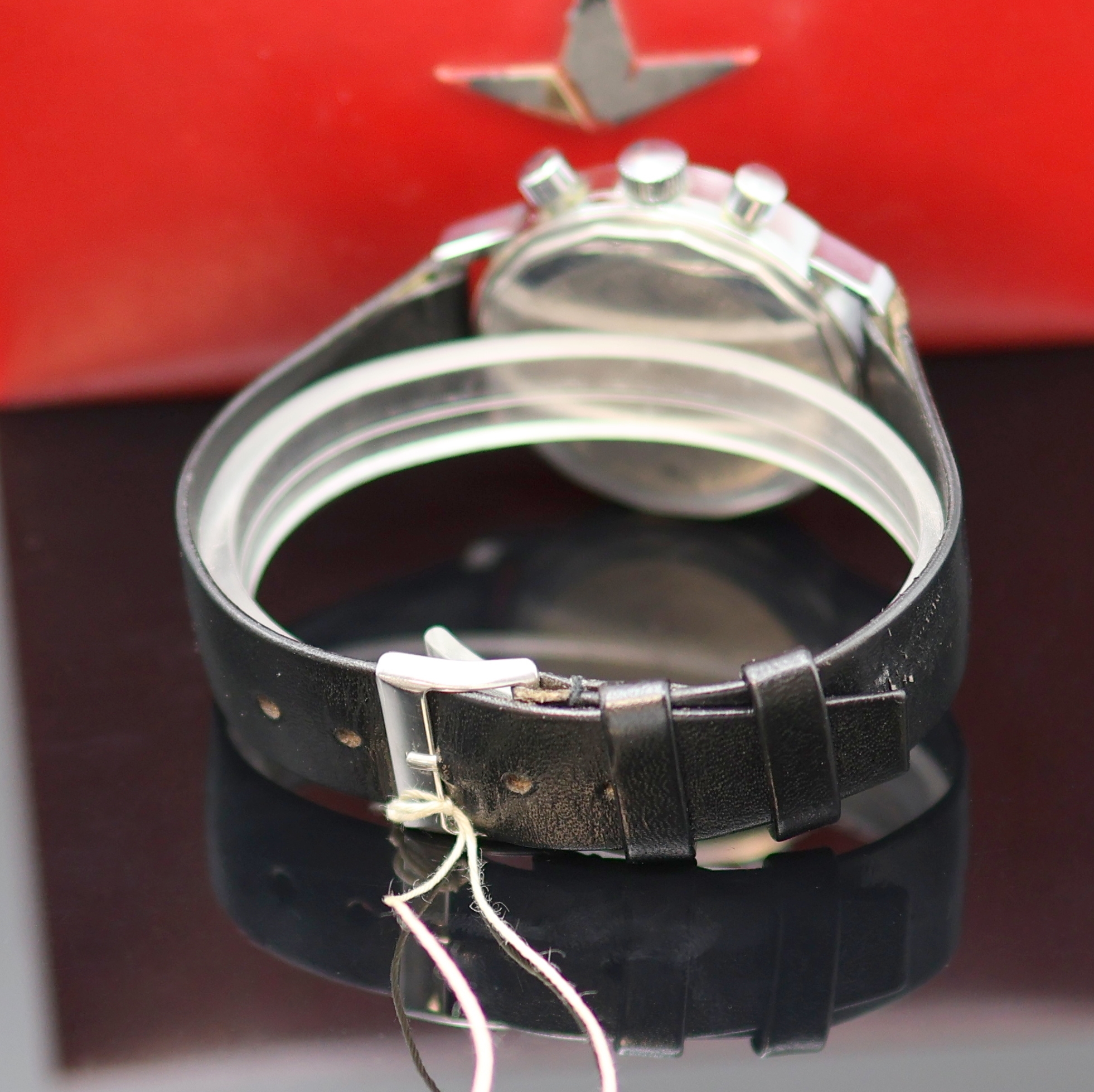Detail c: DUGENA Herrenarmbanduhr mit Chronograph, Handaufzug, Schweiz um 1970, verchr. Geh. m. verschr. Stahlboden, blaues Zifferbl. m. Tritium-Leuchtindizes, ...