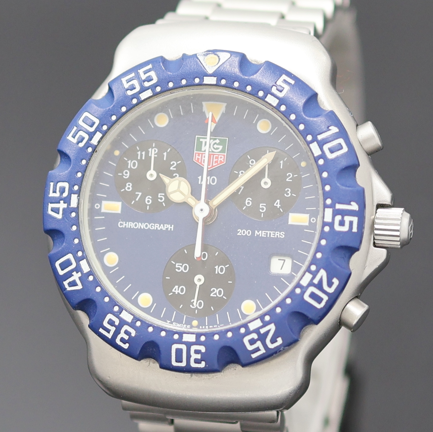 Detail a: TAG HEUER Formula 1 Herrenchronograph in Stahl Referenz 570.513T, Schweiz um 1995, quarz, Boden u. Krone verschr., orig. Gliederband m. Faltschl., ...