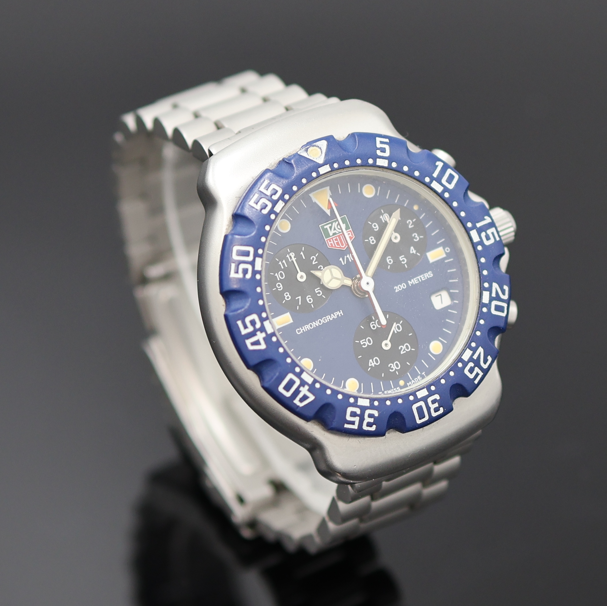 Detail b: TAG HEUER Formula 1 Herrenchronograph in Stahl Referenz 570.513T, Schweiz um 1995, quarz, Boden u. Krone verschr., orig. Gliederband m. Faltschl., ...
