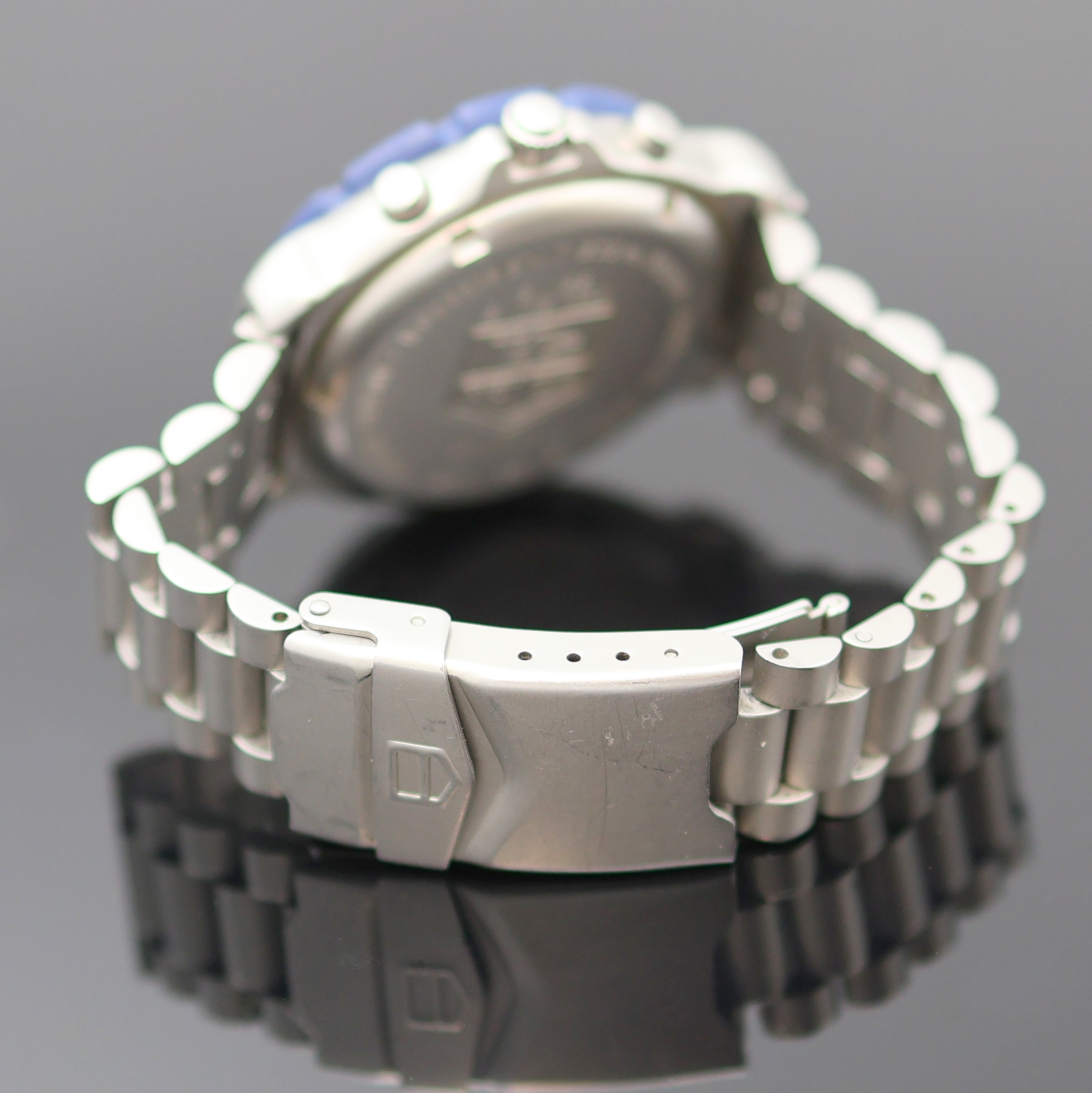 Detail c: TAG HEUER Formula 1 Herrenchronograph in Stahl Referenz 570.513T, Schweiz um 1995, quarz, Boden u. Krone verschr., orig. Gliederband m. Faltschl., ...