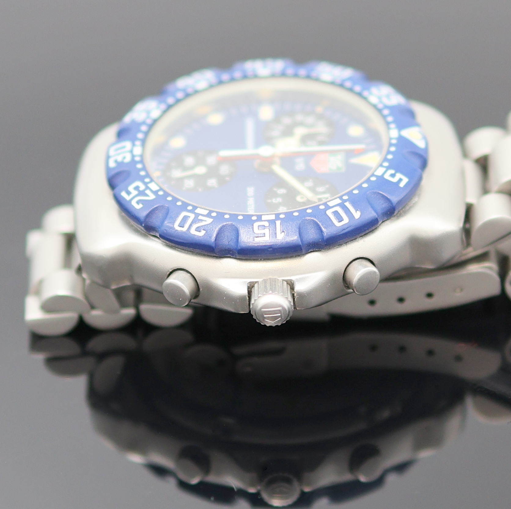 Detail d: TAG HEUER Formula 1 Herrenchronograph in Stahl Referenz 570.513T, Schweiz um 1995, quarz, Boden u. Krone verschr., orig. Gliederband m. Faltschl., ...
