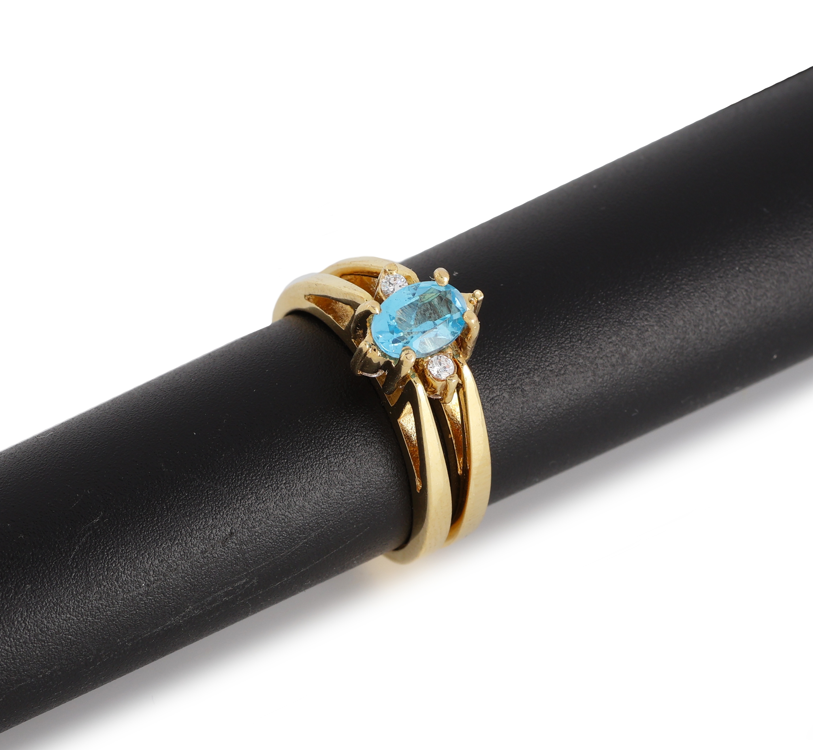 Detail a: 14 kt Gold Topas-Wechselring, GG 585/000, 2 Ringschienen umklappbar, Ringkopf 1Seite mit 9 Zirkonias, andere Seite ovalfacett. Blautopas (beh.) ca. ...