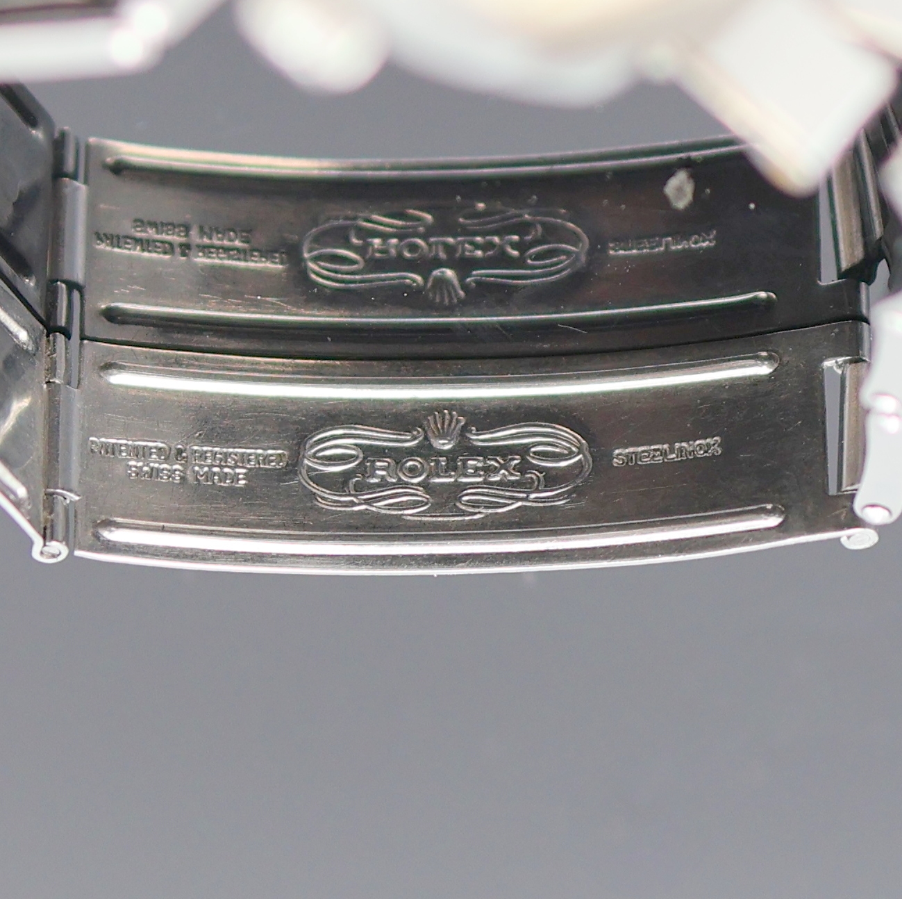 Detail d: ROLEX Oyster Date Precision Armbanduhr Referenz 6694, Schweiz um 1965, Handaufzug, Boden u. Krone verschr., orig. Stahlband Ref. 7205, Anstoß-Nr. 09 ...