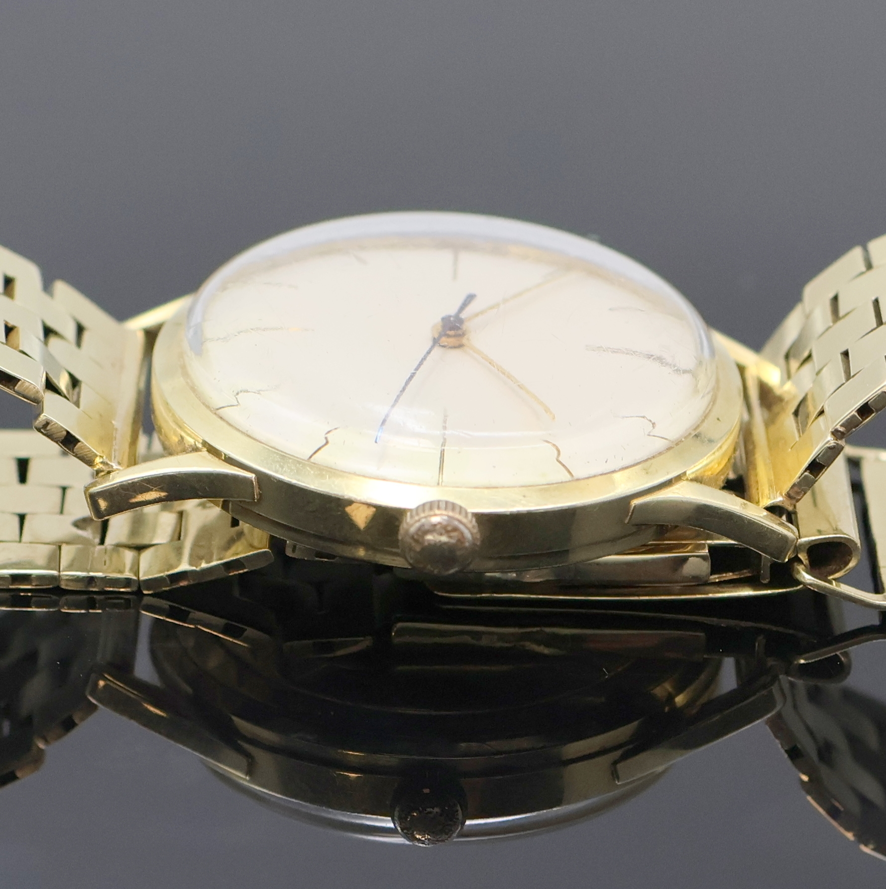 Detail c: Armbanduhr mit schweren Goldband in GG 585/000, Schweiz um 1960, Automatik, Boden verschr., abnehmbares Band m. Faltschl., silb. Zifferbl. m. gold. ...
