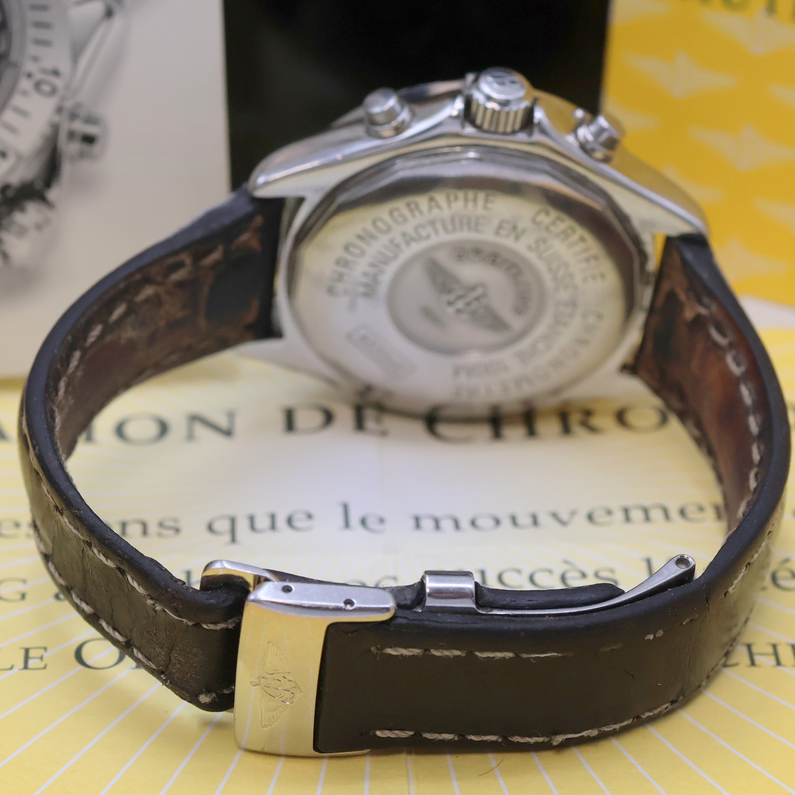 Detail b: BREITLING Transocean Armbandchronograph in Stahl Referenz A53340, Schweiz um 2000, quarz, Boden u. Krone verschr., eins. drehb. Lünette m. 60er ...