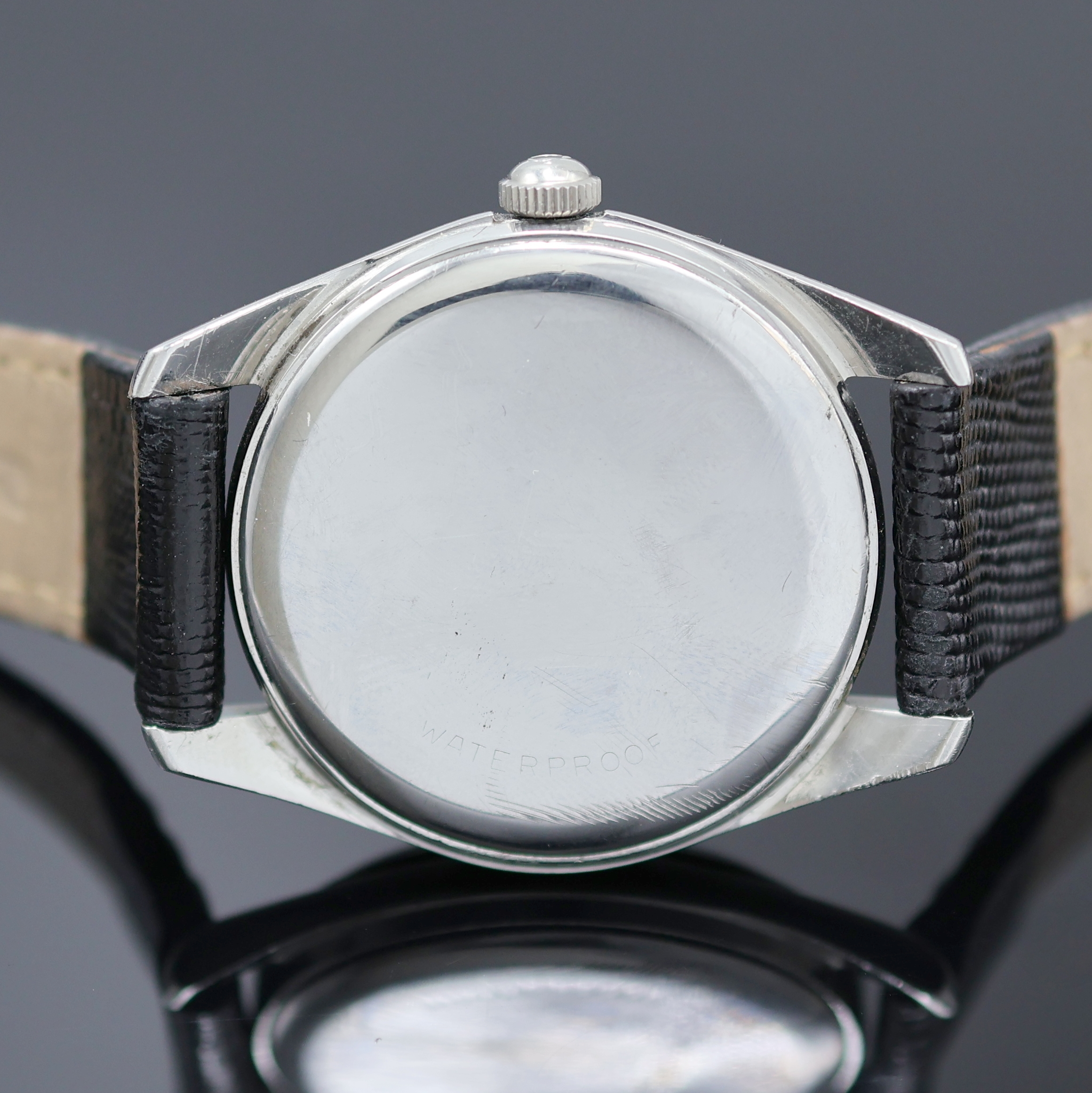 Detail c: OMEGA Ranchero seltene Herrenarmbanduhr Referenz 2996, Schweiz um 1960, Handaufzug, Boden aufgedr., orig. Krone, neutr. Lederband m. Omega Dornschl., ...