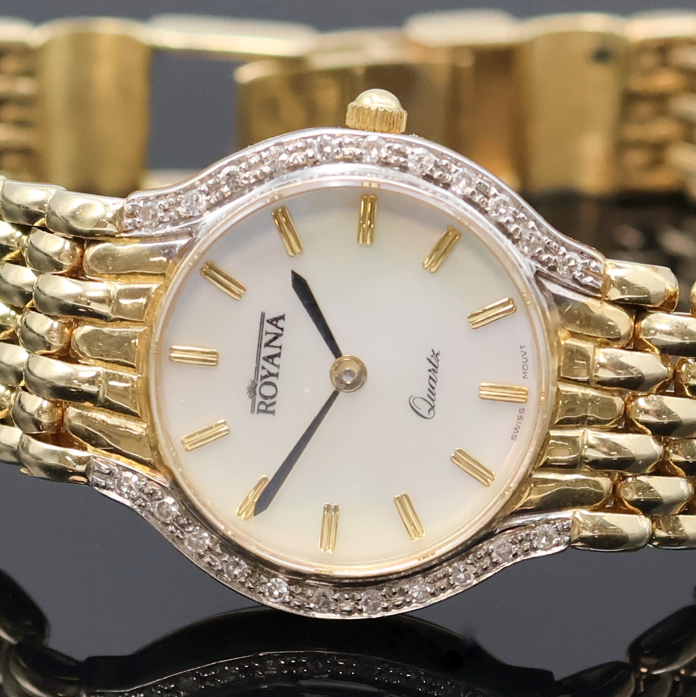 Detail a: ROYANA Armbanduhr in GG 585/000, Schweiz um 1990, quarz, Boden aufgedr., Goldband m. Faltschl., Geh. m. Diamantbesatz, silb. Zifferbl. m. aufges. ...