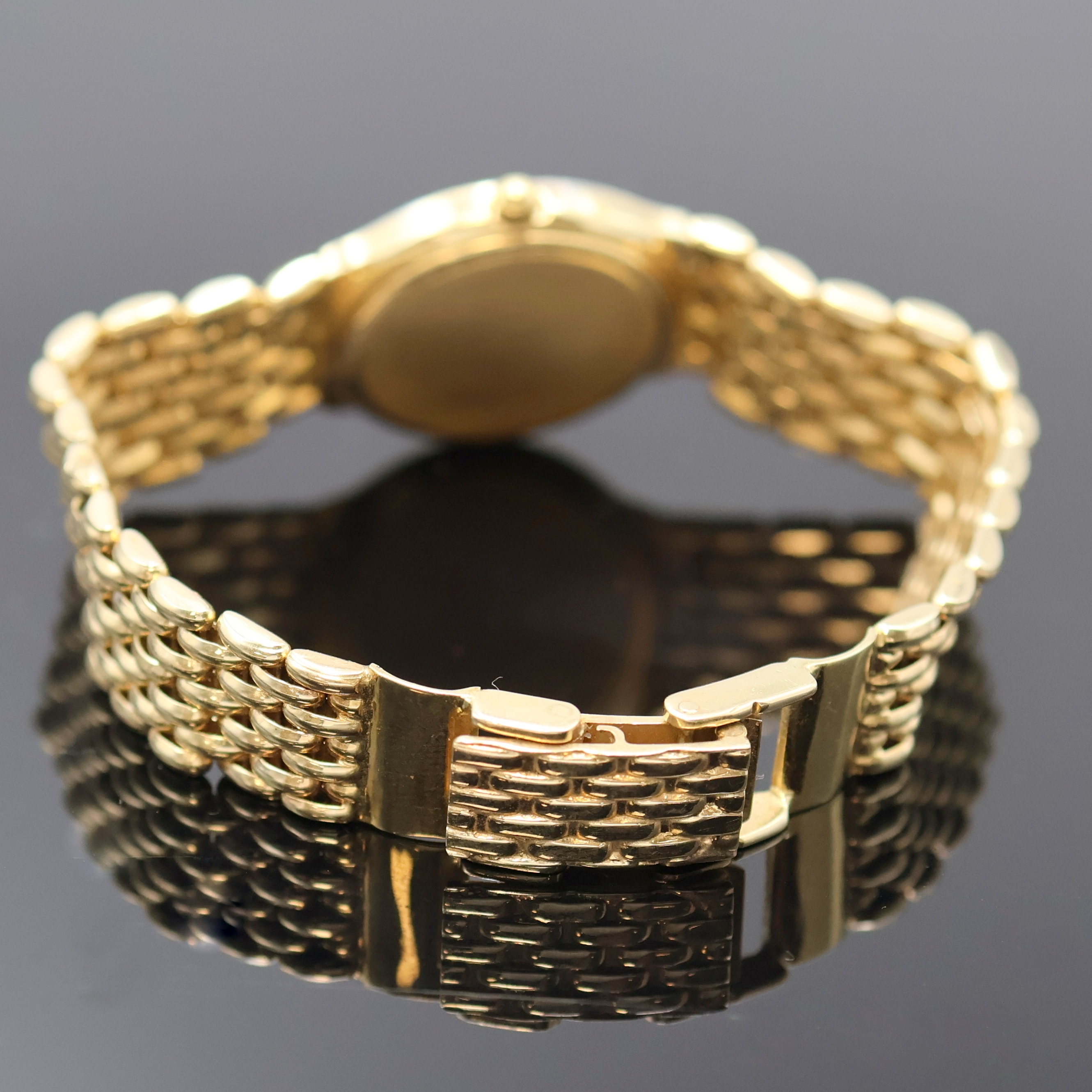 Detail b: ROYANA Armbanduhr in GG 585/000, Schweiz um 1990, quarz, Boden aufgedr., Goldband m. Faltschl., Geh. m. Diamantbesatz, silb. Zifferbl. m. aufges. ...