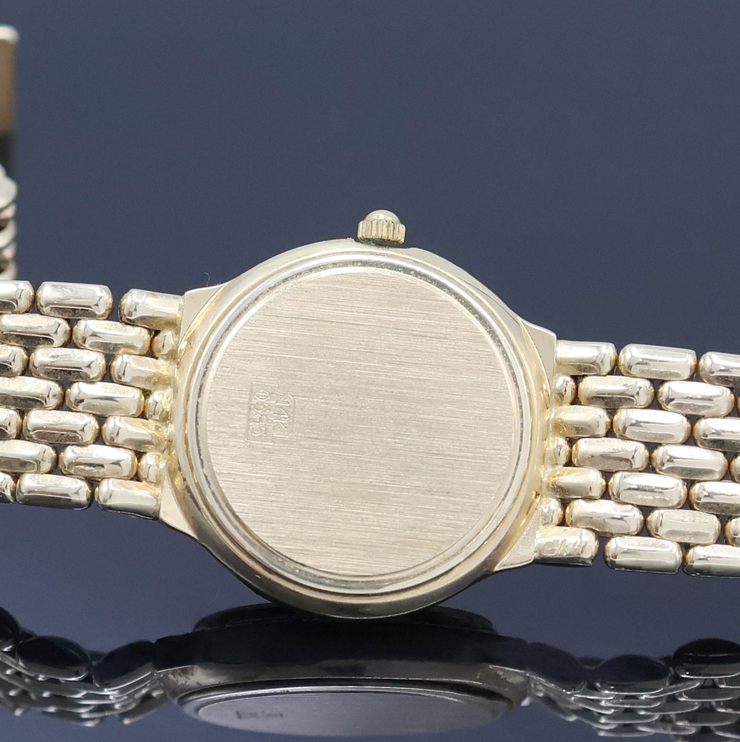 Detail d: ROYANA Armbanduhr in GG 585/000, Schweiz um 1990, quarz, Boden aufgedr., Goldband m. Faltschl., Geh. m. Diamantbesatz, silb. Zifferbl. m. aufges. ...