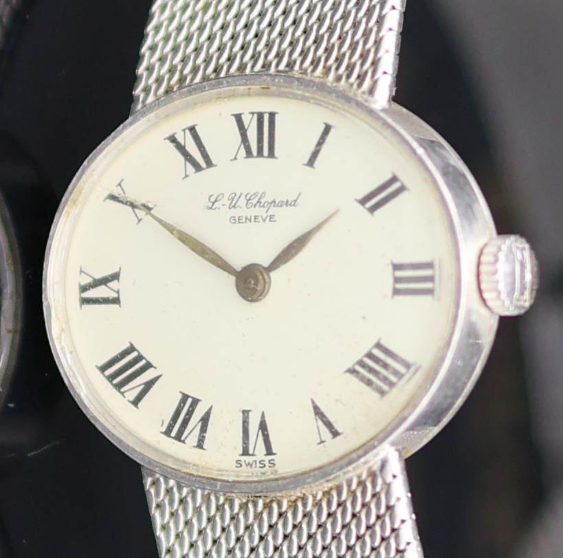 Detail a: CHOPARD Damenarmbanduhr in WG 750/000, Schweiz um 1970, Handaufzug, Boden aufgedr., orig Goldband, Glas besch., silb. Zifferbl. fl., röm. Zahlen, ...