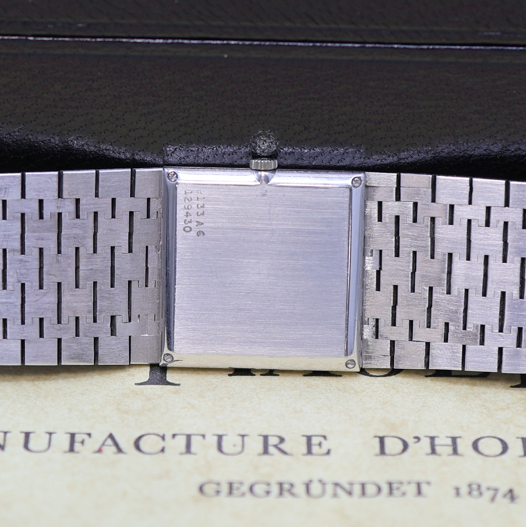 Detail d: PIAGET Armbanduhr in WG 750/000 Referenz 9133A6 mit Box und Papieren, Schweiz verk. lt. beil. Garantieschein 12/1966, Handaufzug, orig. Goldband, ...