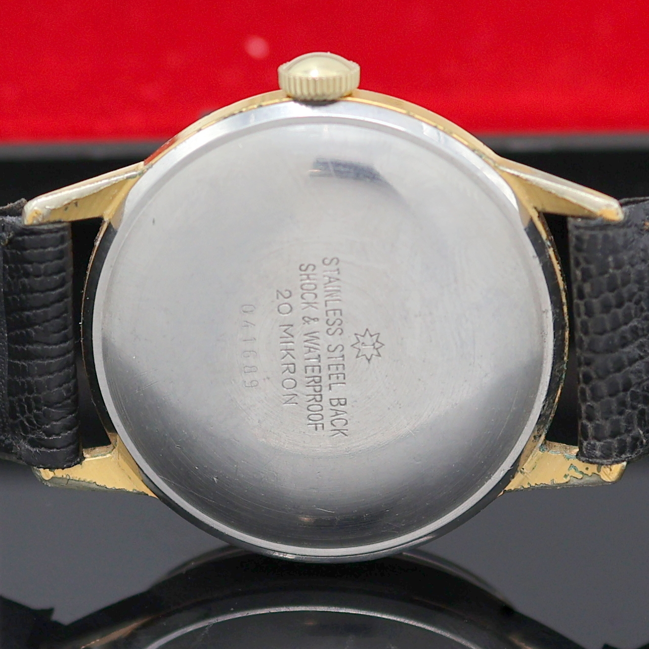 Detail f: JUNGHANS vergoldeter Armbandchronometer, Deutschland um 1960, Handaufzug, Stahlboden aufgedr., silb. Zifferbl. pat./fl., gold. Std.-Ind., gold. ...