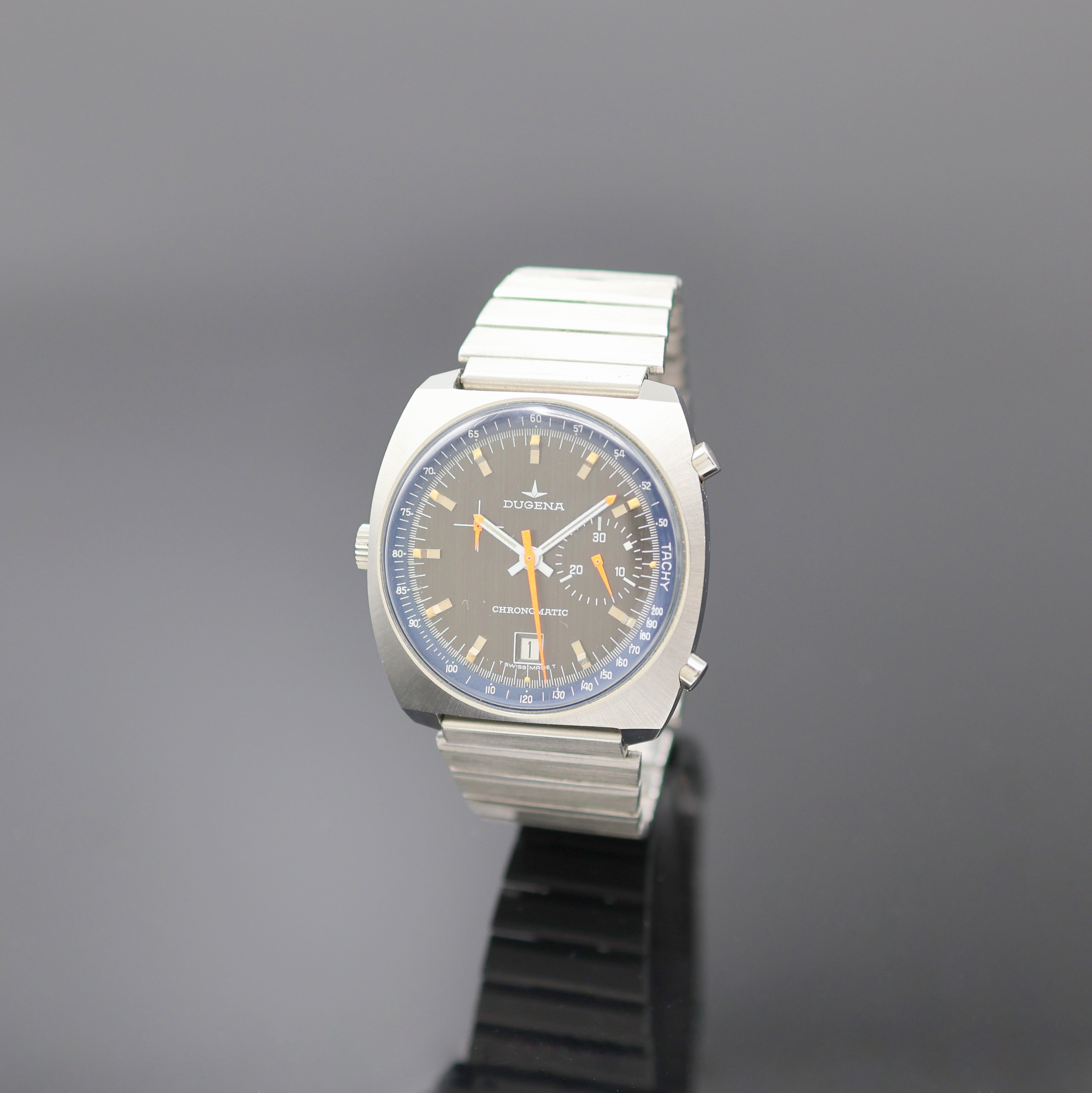 DUGENA Chronomatic Herrenchronograph in Stahl Kaliber 15, Schweiz um 1975, Automatik, kissenförm. Geh., verschr. Glasboden später, am passenden ...