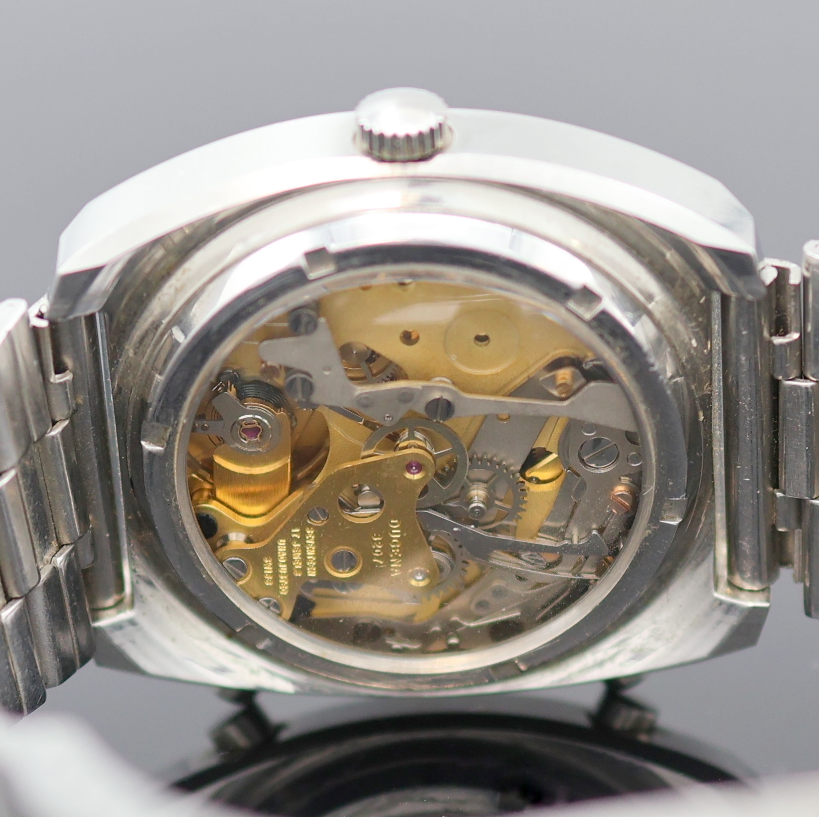 Detail f: DUGENA Chronomatic Herrenchronograph in Stahl Kaliber 15, Schweiz um 1975, Automatik, kissenförm. Geh., verschr. Glasboden später, am passenden ...
