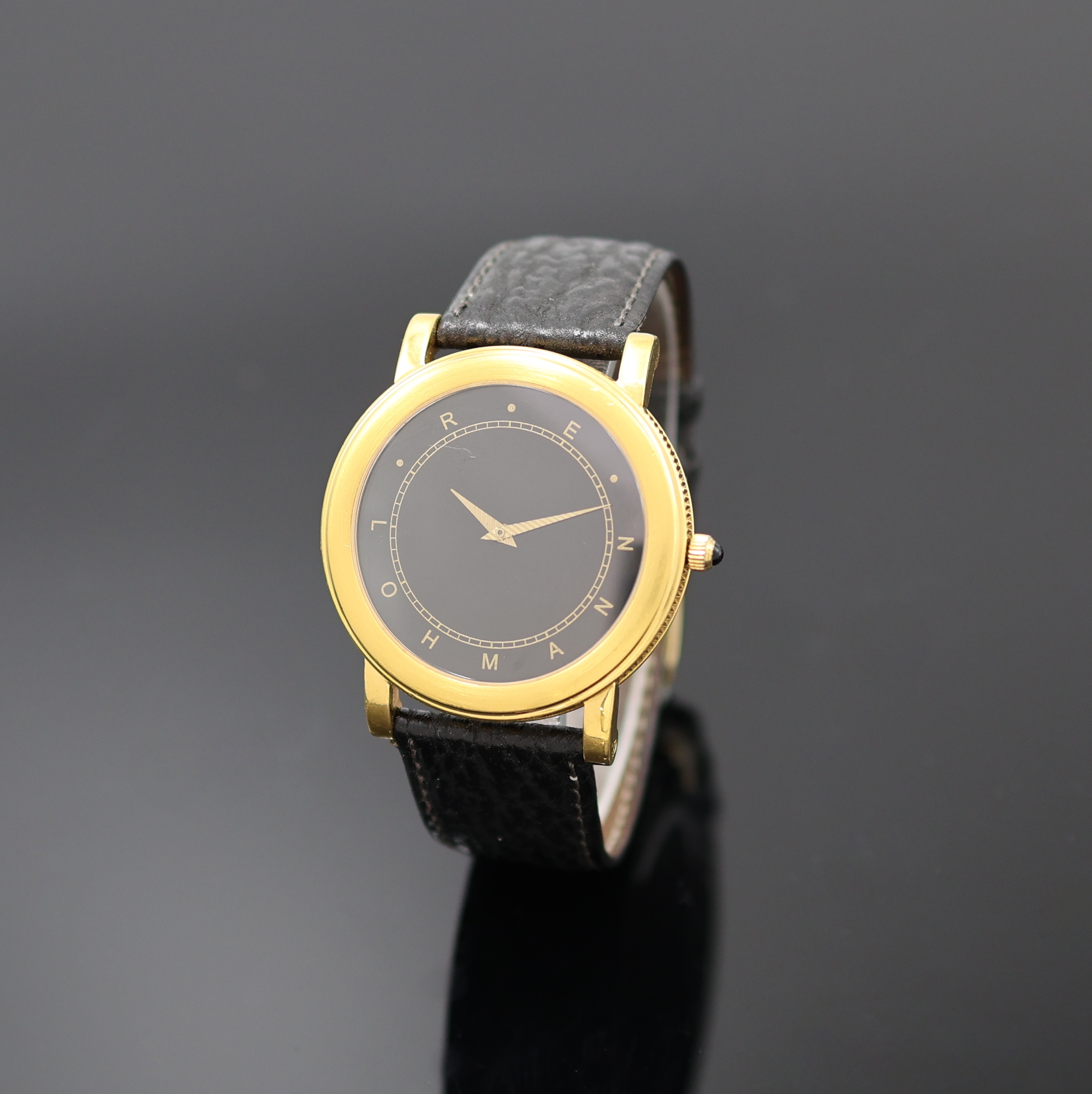 LOHMANN Armbanduhr in GG 585/000, Schweiz/ Deutschland um 2000, Automatik, beids. vergl. Geh. m. geripptem Rand, Boden 6-fach verschr., schwarzes ...
