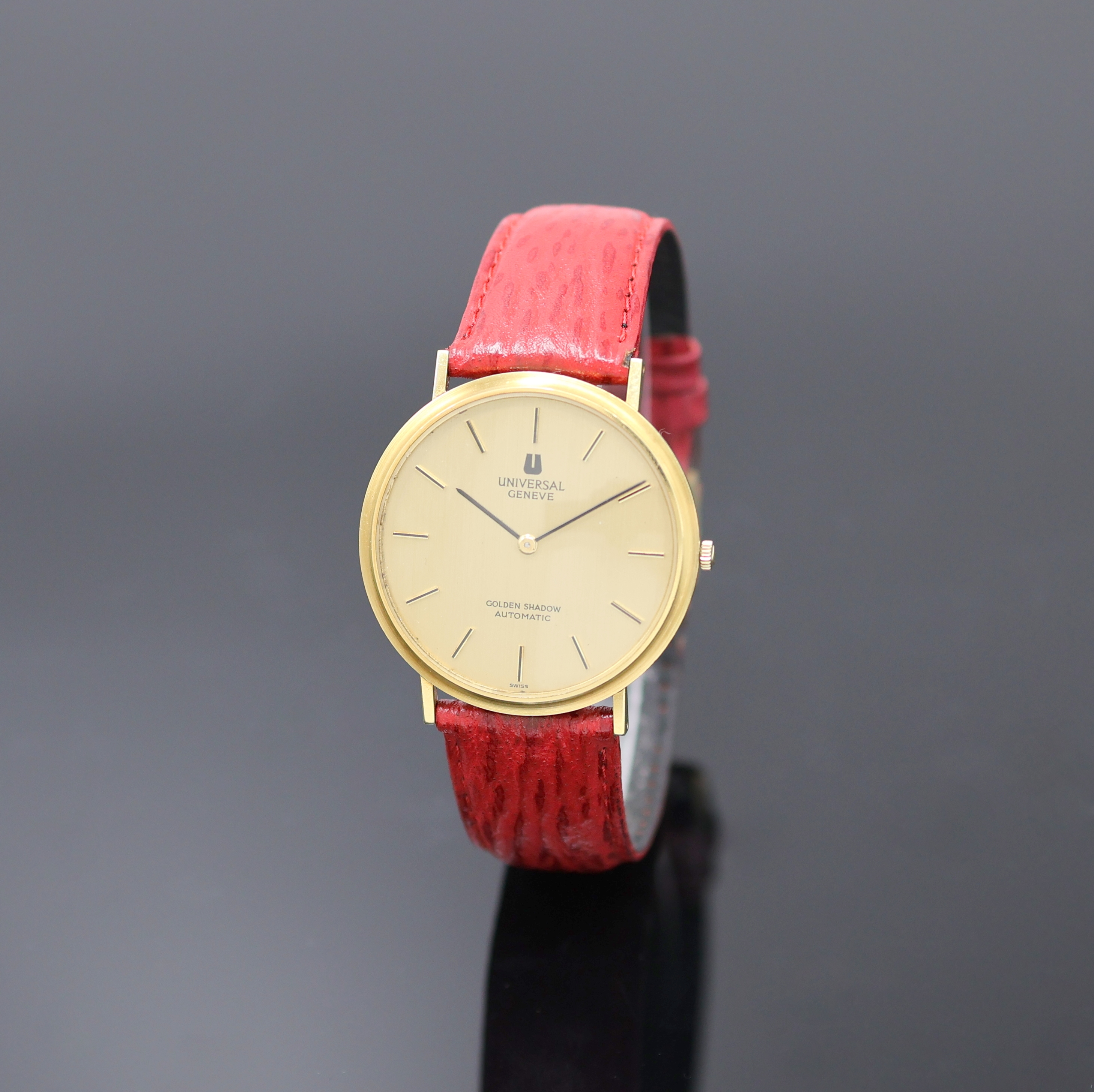 UNIVERSAL GENEVE Golden Shadow Armbanduhr in GG 750/000 Referenz 166132, Schweiz um 1970, Automatik, 2-tlg. Geh., Boden aufgedr., gold. Zifferbl., ...