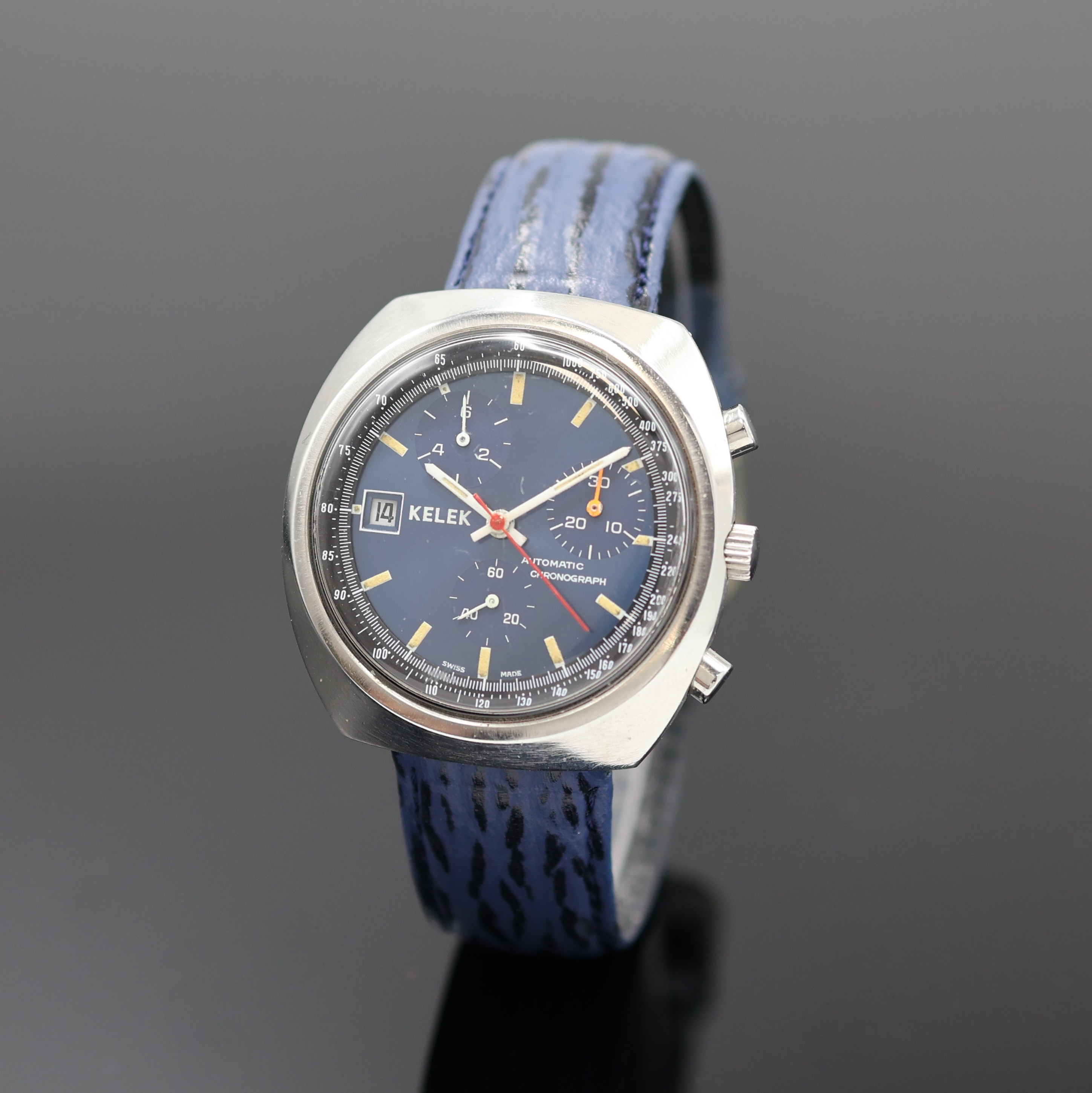 KELEK TBD Automatic Herrenchronograph in Stahl, Schweiz um 1975, 2-tlg. Geh., Boden verschr., blaues Zifferbl., äußere schwarze Tachymeterskala, ...