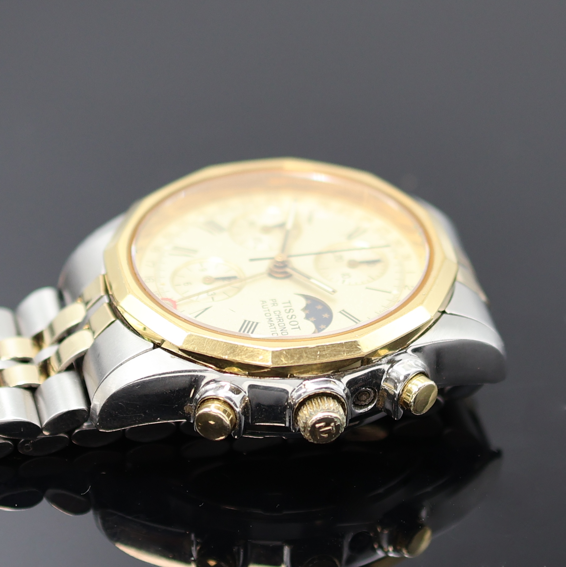 Detail c: TISSOT PR 100 Herrenchronograph in Stahl/ vergoldet, Schweiz um 1980, Automatik, verschr. Geh., 12-eckig facettierte Lünette, orig. Band m. ...