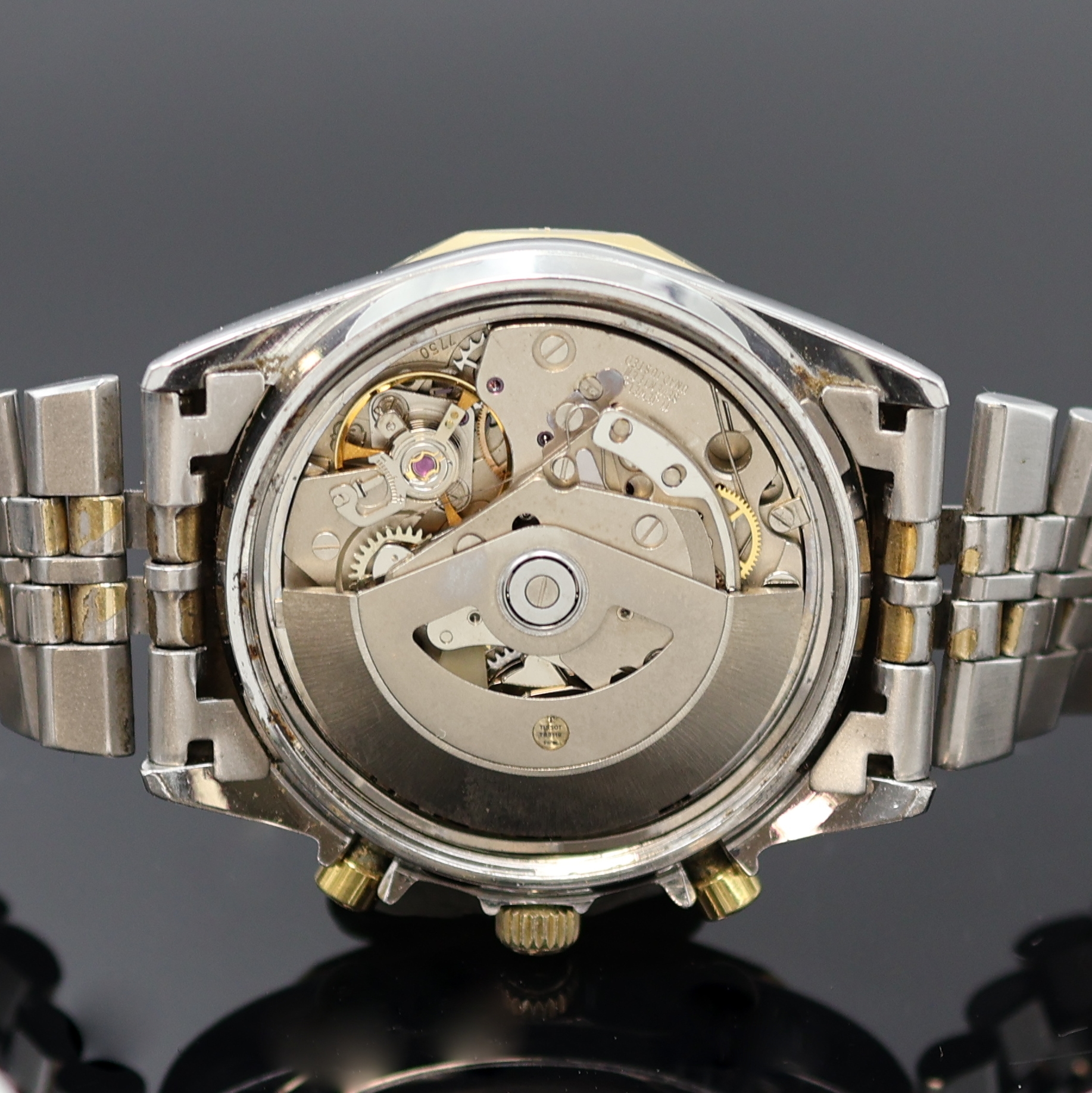 Detail f: TISSOT PR 100 Herrenchronograph in Stahl/ vergoldet, Schweiz um 1980, Automatik, verschr. Geh., 12-eckig facettierte Lünette, orig. Band m. ...