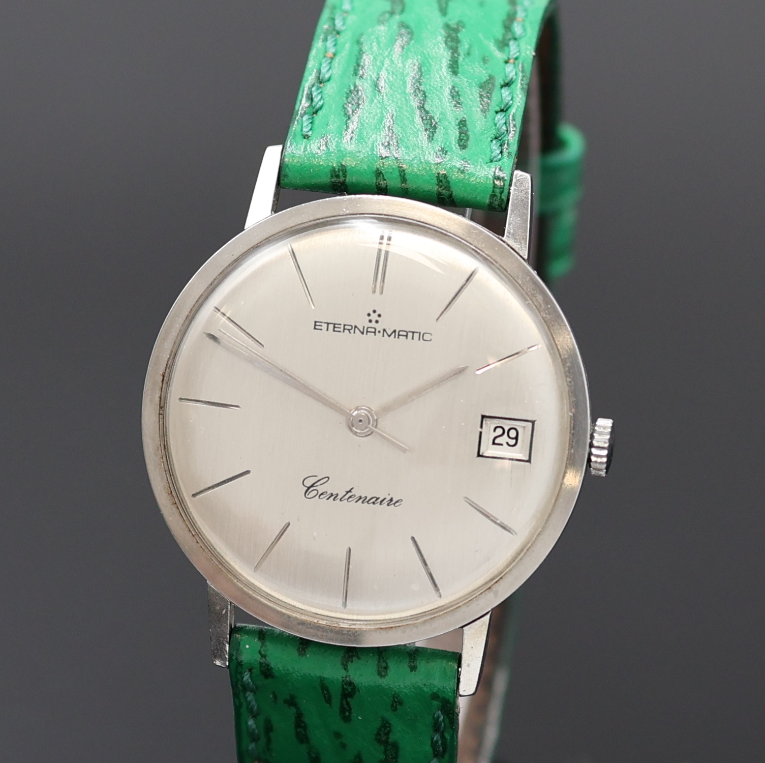 Detail a: ETERNA-MATIC Centenaire Armbanduhr in Stahl, Schweiz um 1965, Automatik, flaches 3-tlg. Geh., Boden u. Glasrand aufgedr., silb. Zifferbl. rest., ...