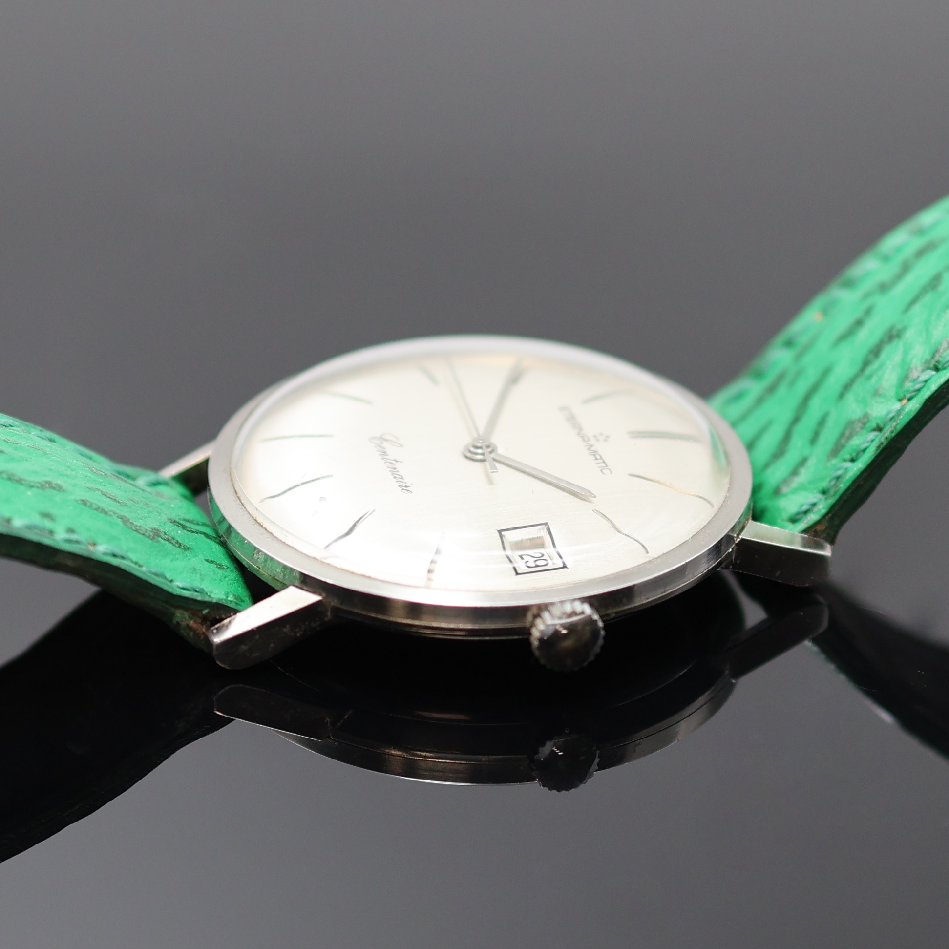 Detail b: ETERNA-MATIC Centenaire Armbanduhr in Stahl, Schweiz um 1965, Automatik, flaches 3-tlg. Geh., Boden u. Glasrand aufgedr., silb. Zifferbl. rest., ...