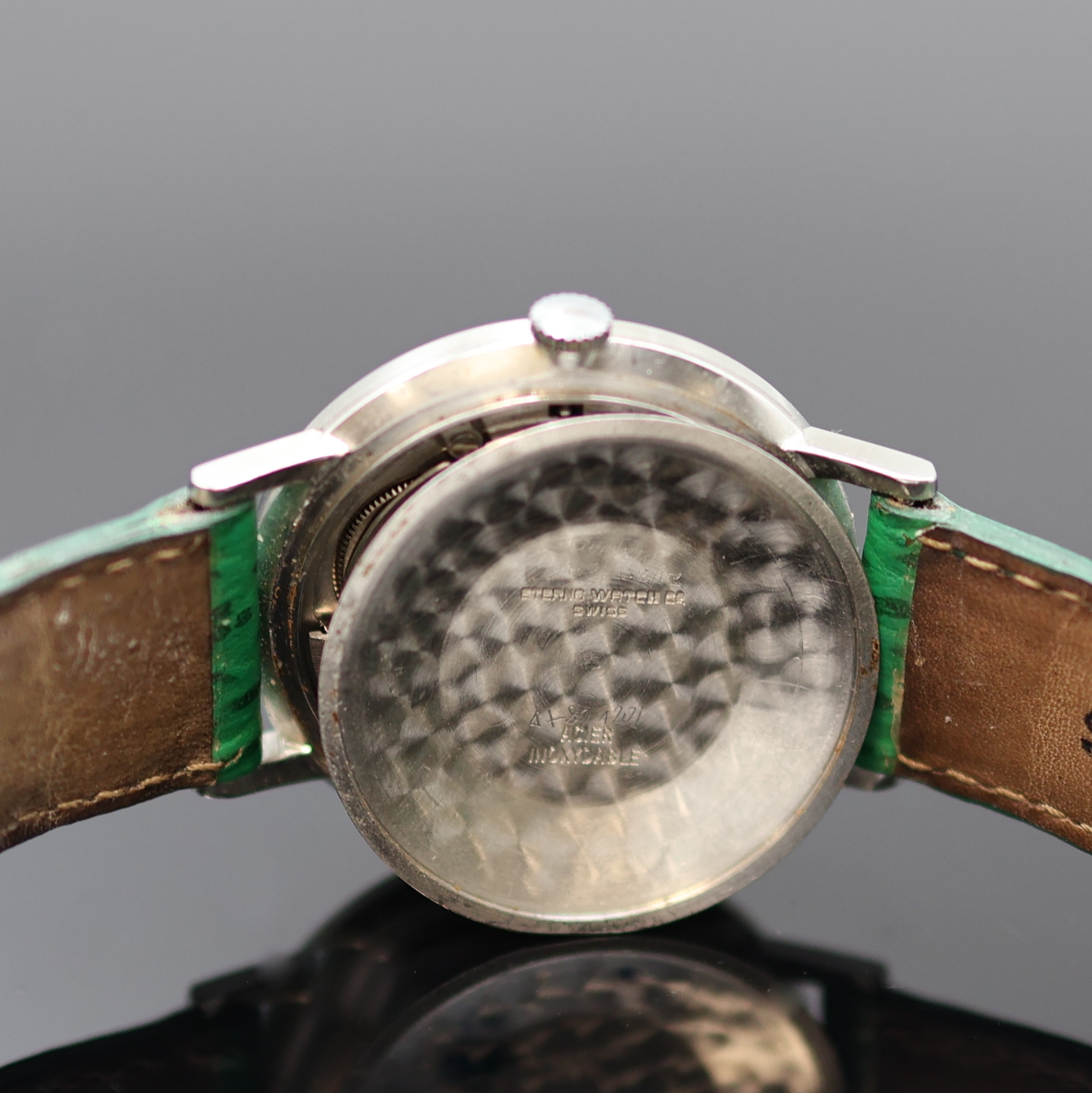 Detail f: ETERNA-MATIC Centenaire Armbanduhr in Stahl, Schweiz um 1965, Automatik, flaches 3-tlg. Geh., Boden u. Glasrand aufgedr., silb. Zifferbl. rest., ...