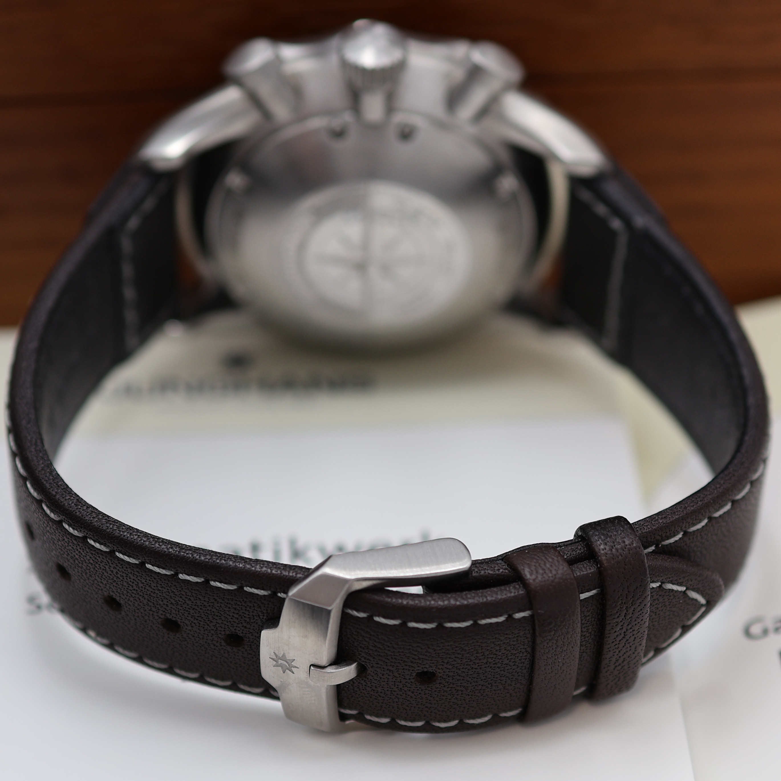 Detail b: JUNGHANS Herrenchronograph Chronoscope Referenz 027/3591.00, Schweiz verk. lt. beil. Pap. 05/2016, Automatik, Edelstahlgeh., Boden 7-fach verschr., ...
