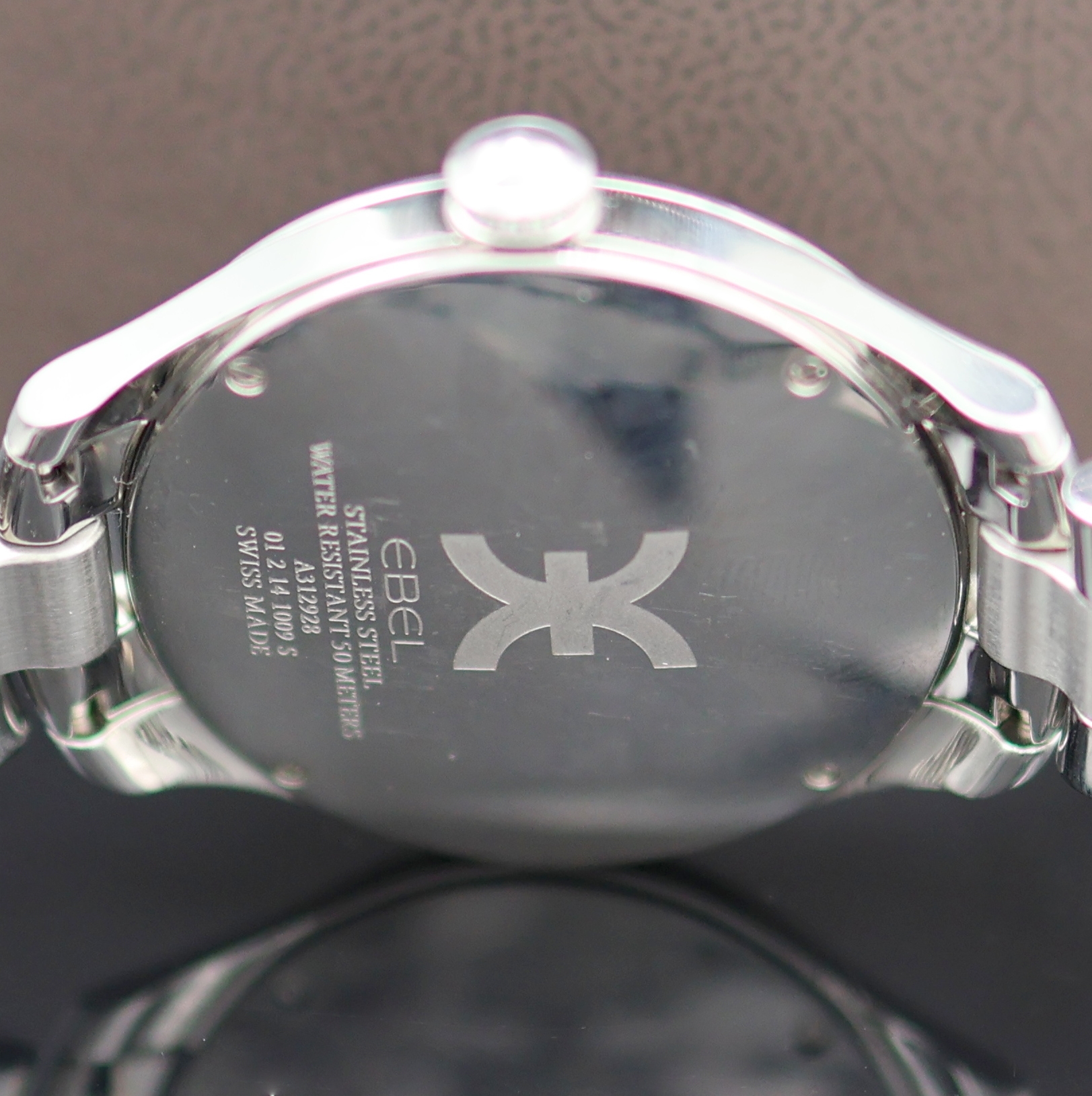 Detail d: EBEL Damenarmbanduhr Onde, Schweiz um 2020, Edelstahlgeh. inkl. Gliederband m. dopp. Faltschl., quarz, Boden 4-fach verschr., Perlmuttzifferbl. m. 8 ...