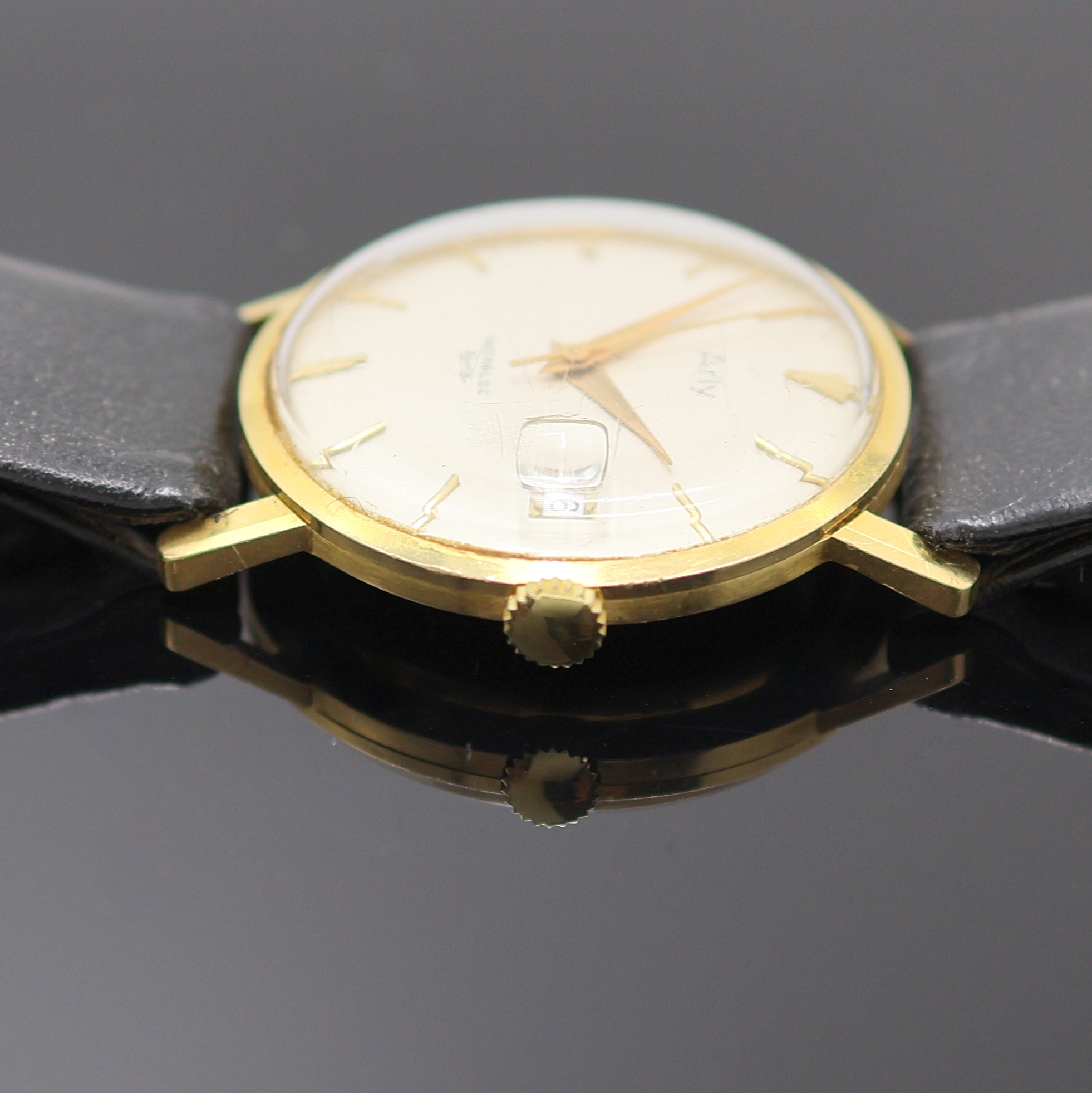 Detail b: ARLY Armbanduhr in GG 750/000, Schweiz um 1960, Automatik, Boden aufgedr., silb. Zifferbl. m. gold. Std.-Ind., gold. Zeiger, Datum b. 3, verg. Werk ...