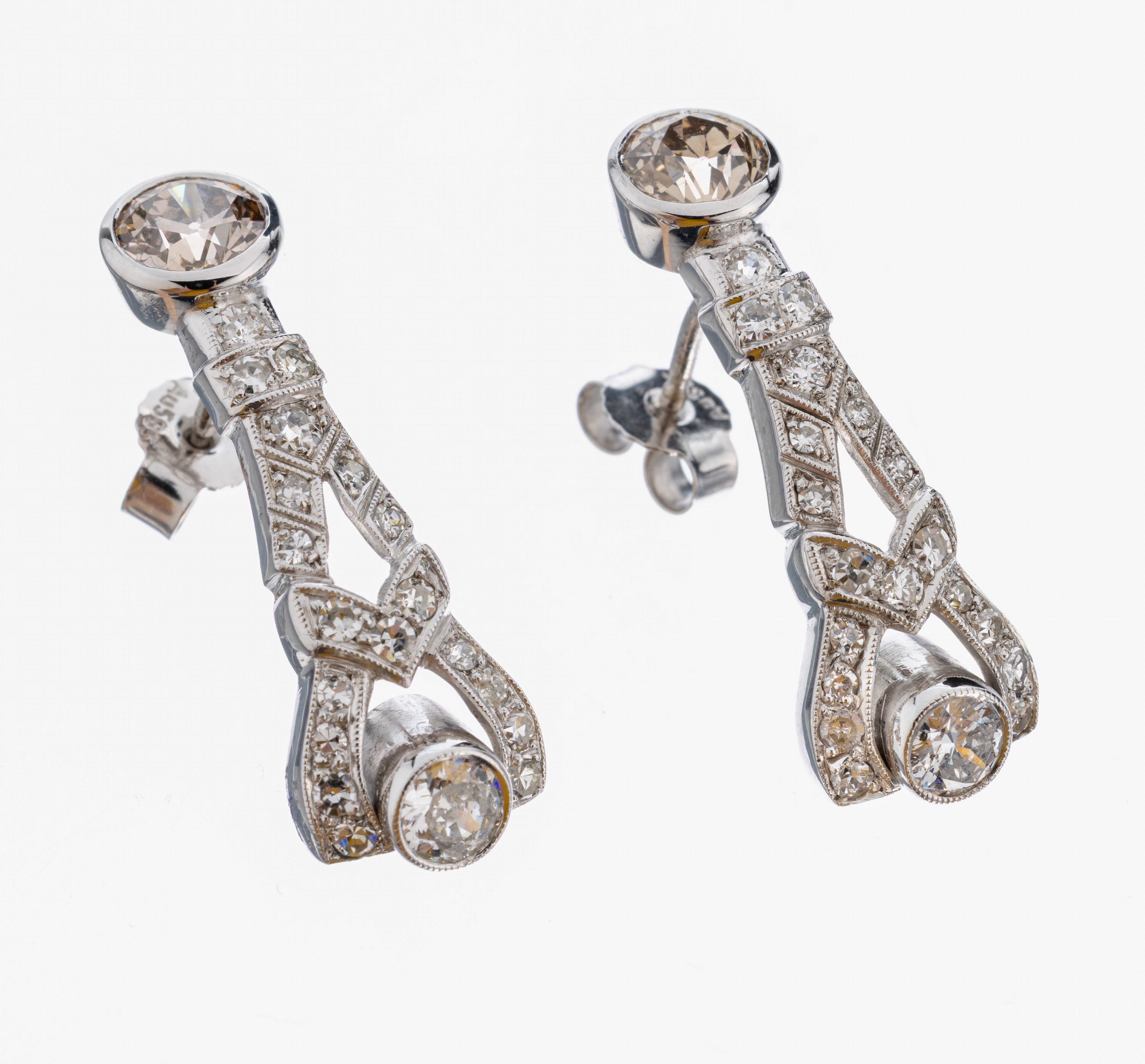 Paar 14 kt Gold Brillant-Ohrstecker, WG 585/000, Brillanten zus. ca. 1.40 ct Weiß- Getönt/si, L. ca. 2.8 cm, ca. 5.0 g