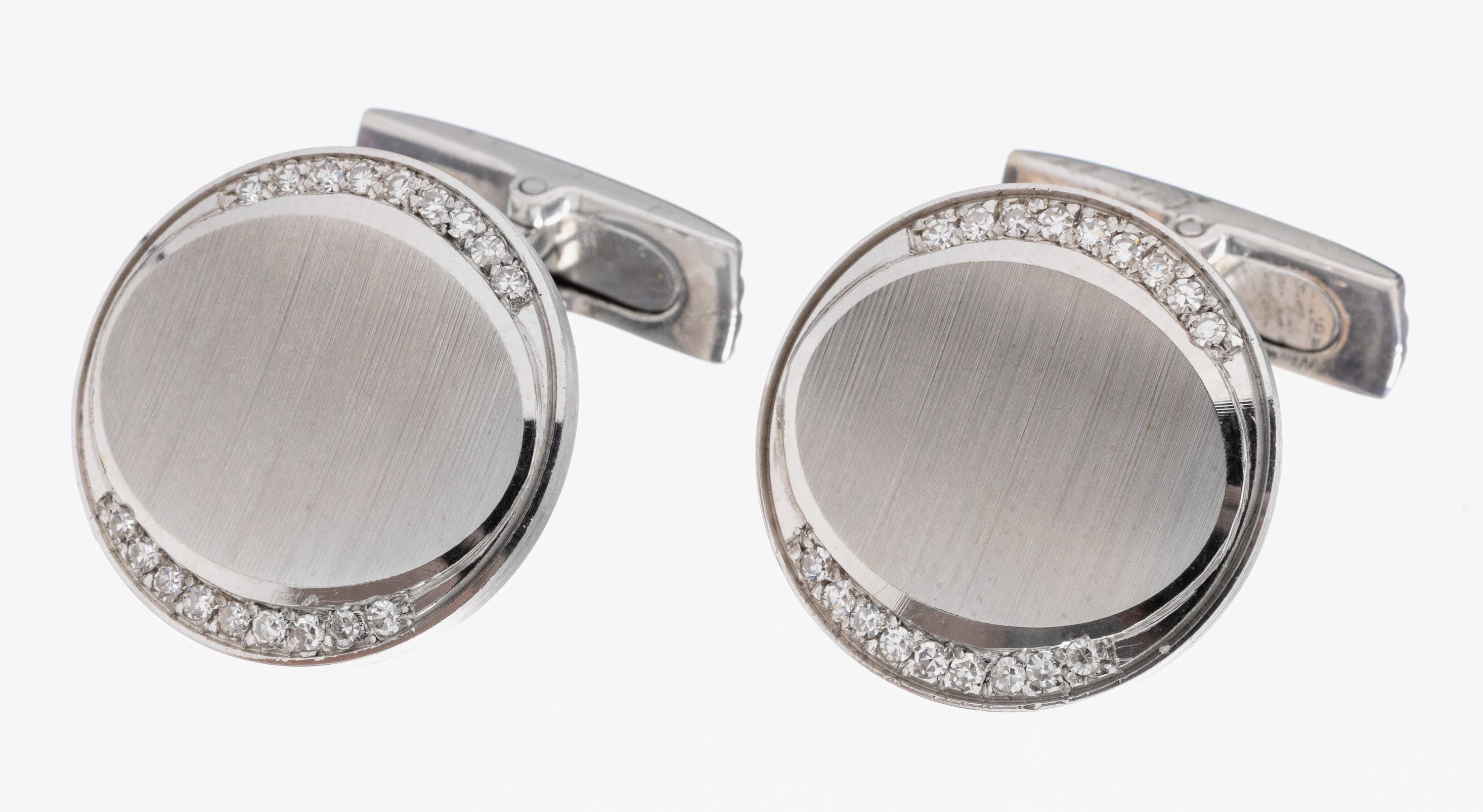 Paar 18 kt Gold Diamant-Manschettenknöpfe, WG 750/000 part. sat., 36 8/8-Diamanten zus. ca. 0.40 ct Weiß/si, ca. 16.9 g