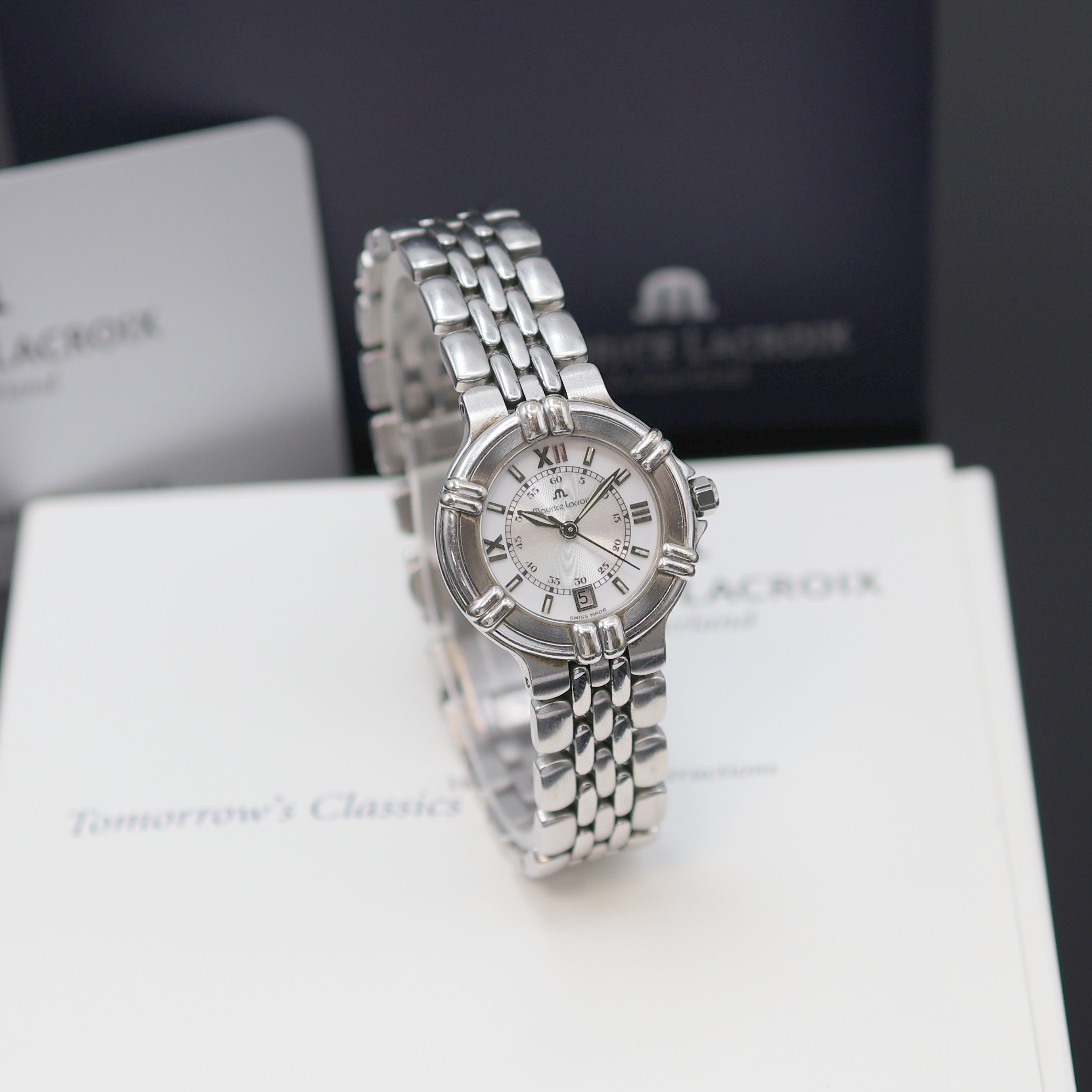 Detail b: MAURICE LACROIX Calypso Damenarmbanduhr Referenz 75344, Schweiz um 2000, quarz, Edelstahlgeh. an orig. Gliederband m. dopp. Faltschl., Boden ...