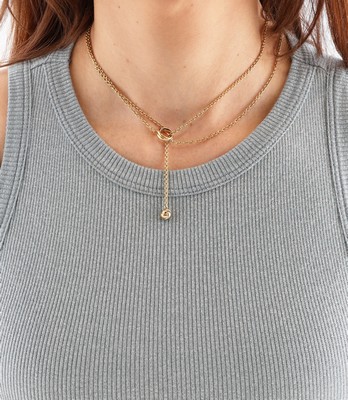 26983003b - 18 kt Gold CARTIER Y-Collier , GG/WG/RG 750/000, Mittelteil mit Trinity Ring, Ende ...