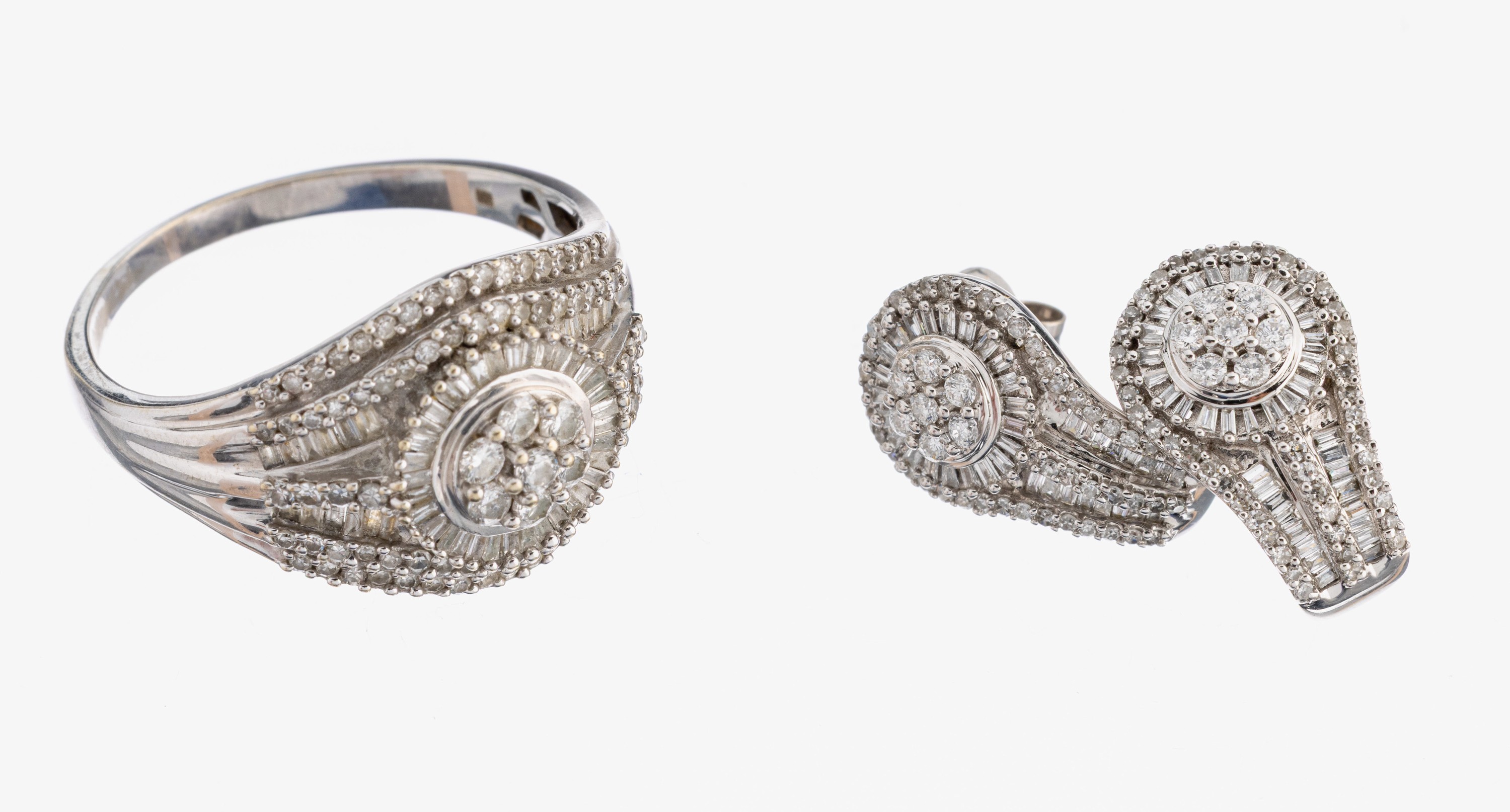 14 kt Gold Diamant-Schmuckset, WG 585/000, best. aus: 1 Ring, RW 66, 7 Brillanten 80 8/8-Diamanten und 60 Diamant-Baguettes zus. ca. 0.75 ct ...