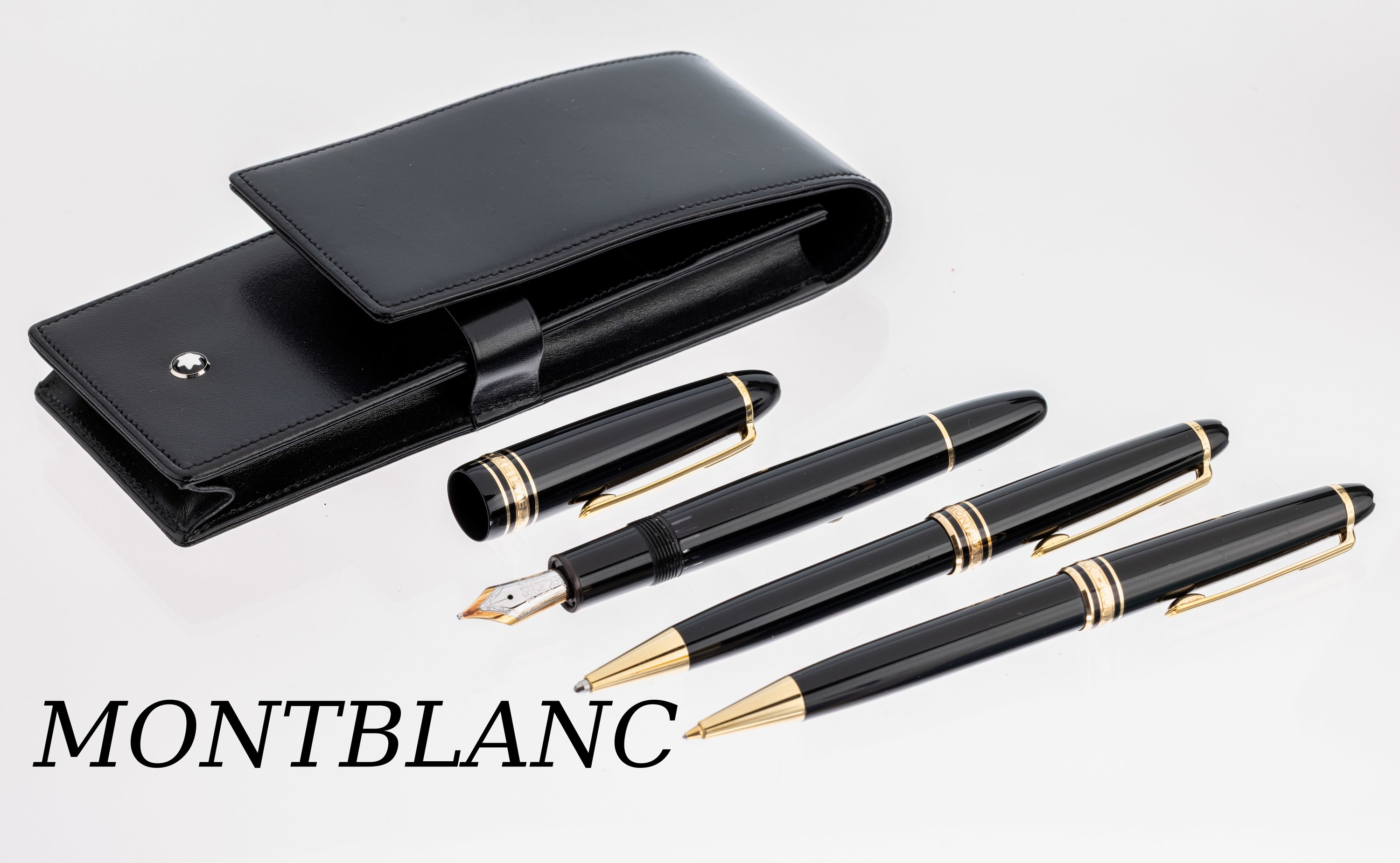 MONTBLANC Set, Meisterstück-Serie, best. aus: Füller, Feder GG/WG 585/000, Stärke M, ein Kugelschreiber und 1 Drehbleistift, Korpusschwarzer ...