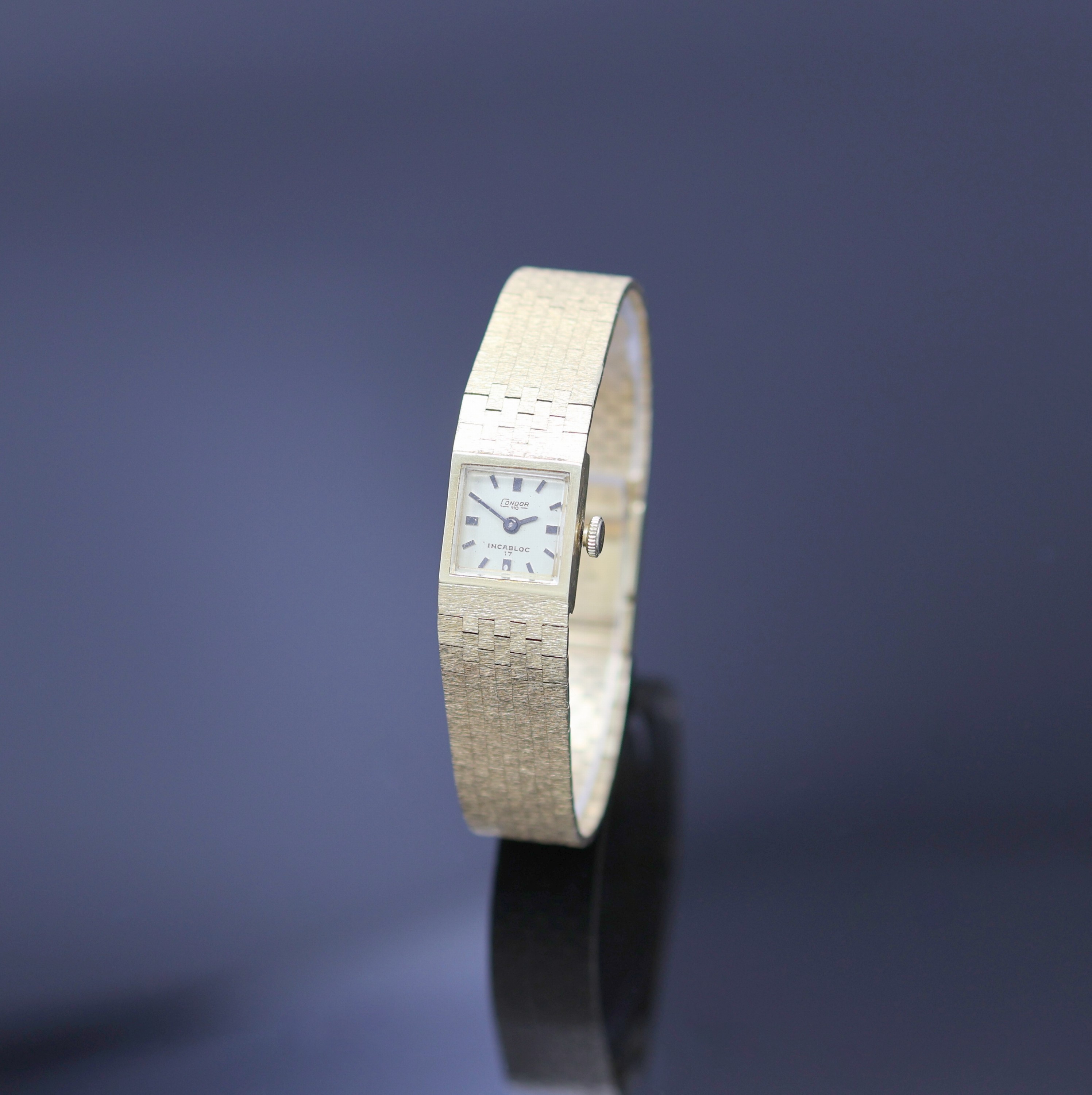 CONDOR 110 Damenarmbanduhr in GG 750/000, Handaufzug, Schweiz um 1965, Goldband, Boden aufgedr., gold. Zifferbl. m. aufges. Std.- Ind., Kal. AS 1977, ...