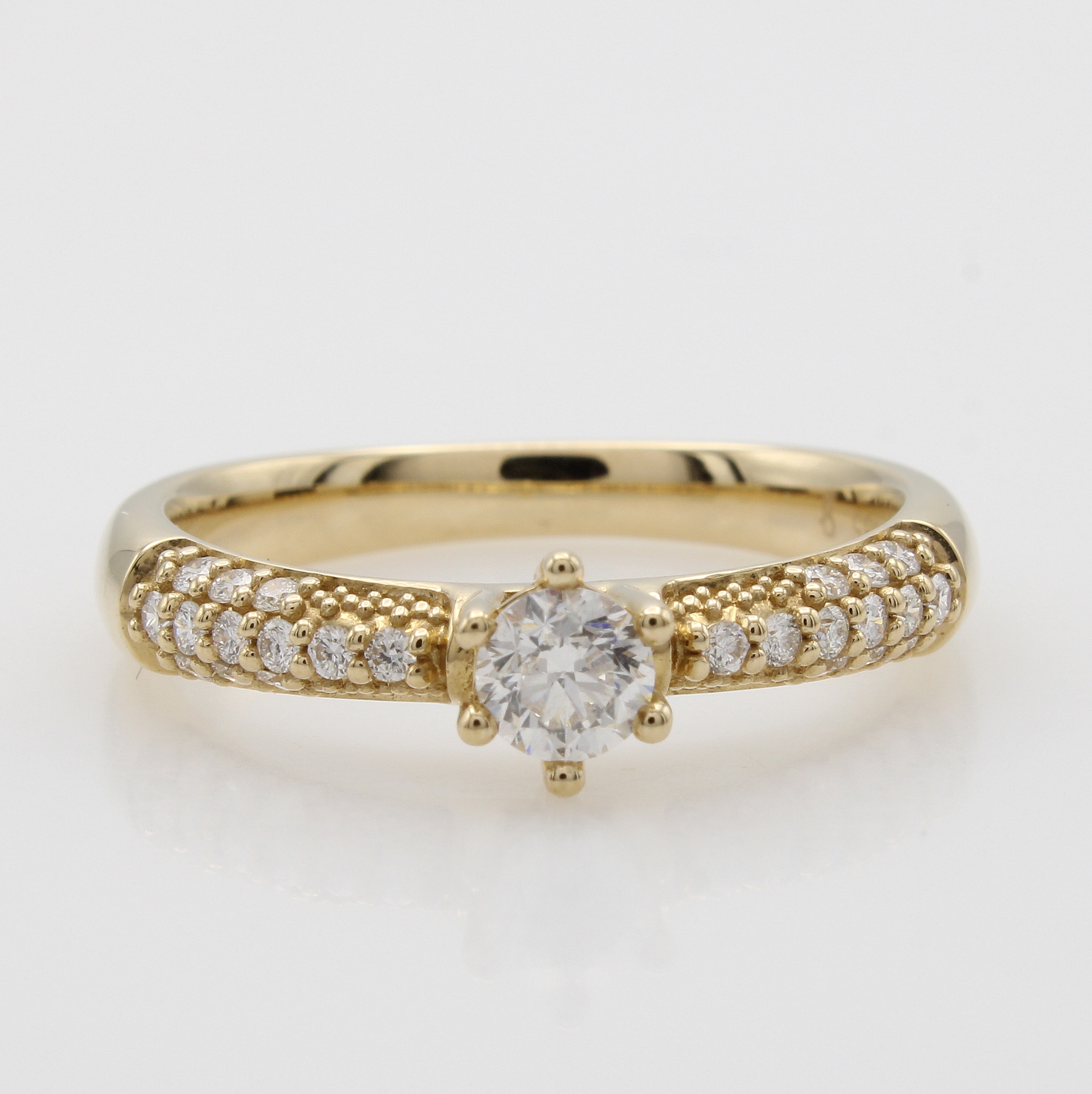 Image 26983944 - Ring mit Brillanten, GG 585/000, Mittelstein ca. 0.20 ct und 24 Besatzbrill. zus. ca. ...