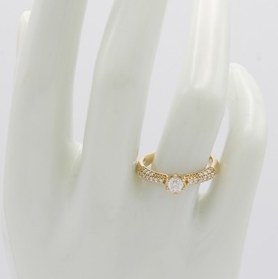 26983944b - Ring mit Brillanten, GG 585/000, Mittelstein ca. 0.20 ct und 24 Besatzbrill. zus. ca. ...