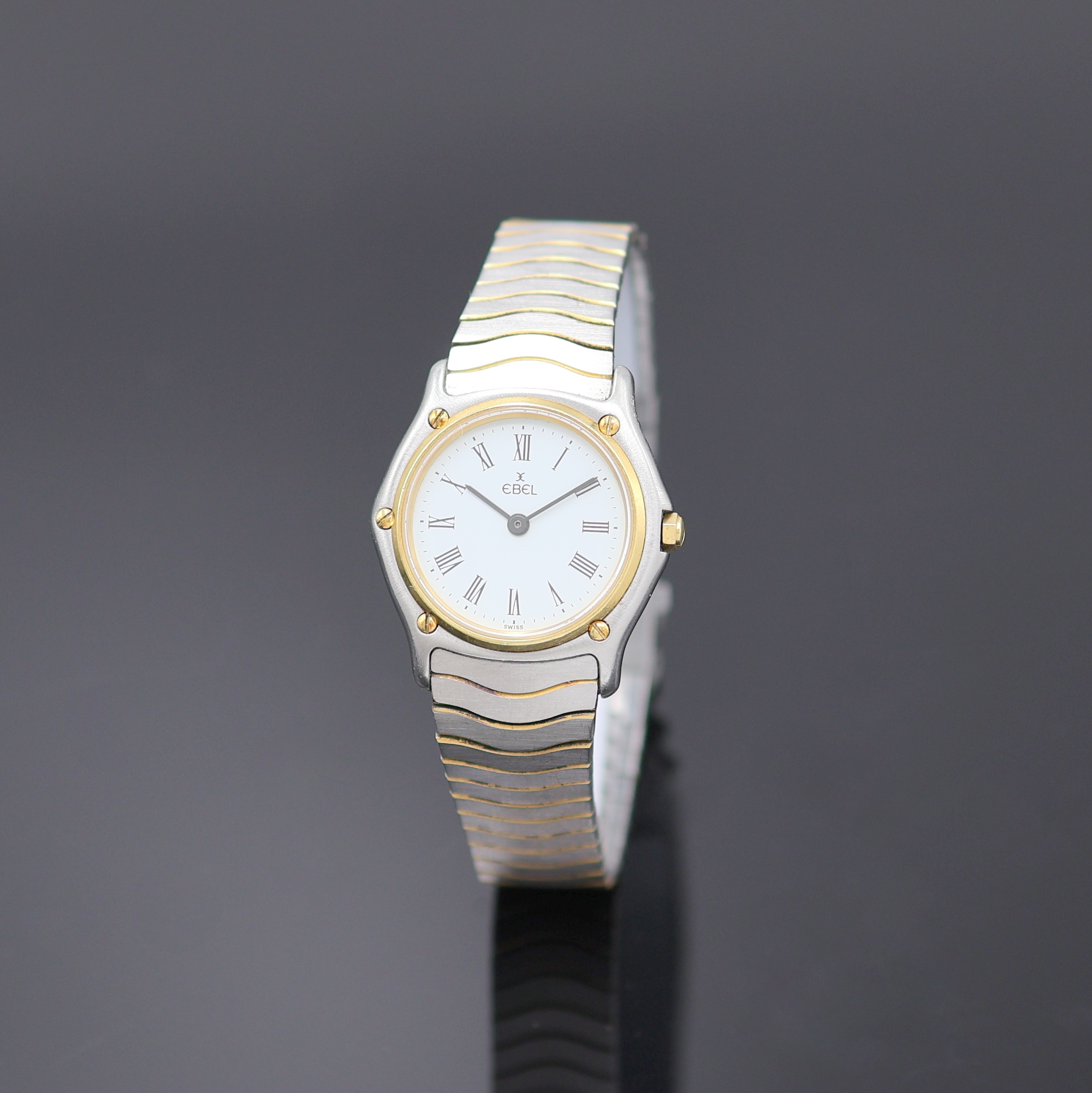 EBEL Damenarmbanduhr, Schweiz um 1990, Edelstahl/Gold kombiniert inkl. Wellengliederband m. Kastenschloß, quarz, Lünette gegen Geh. 5-fach ...