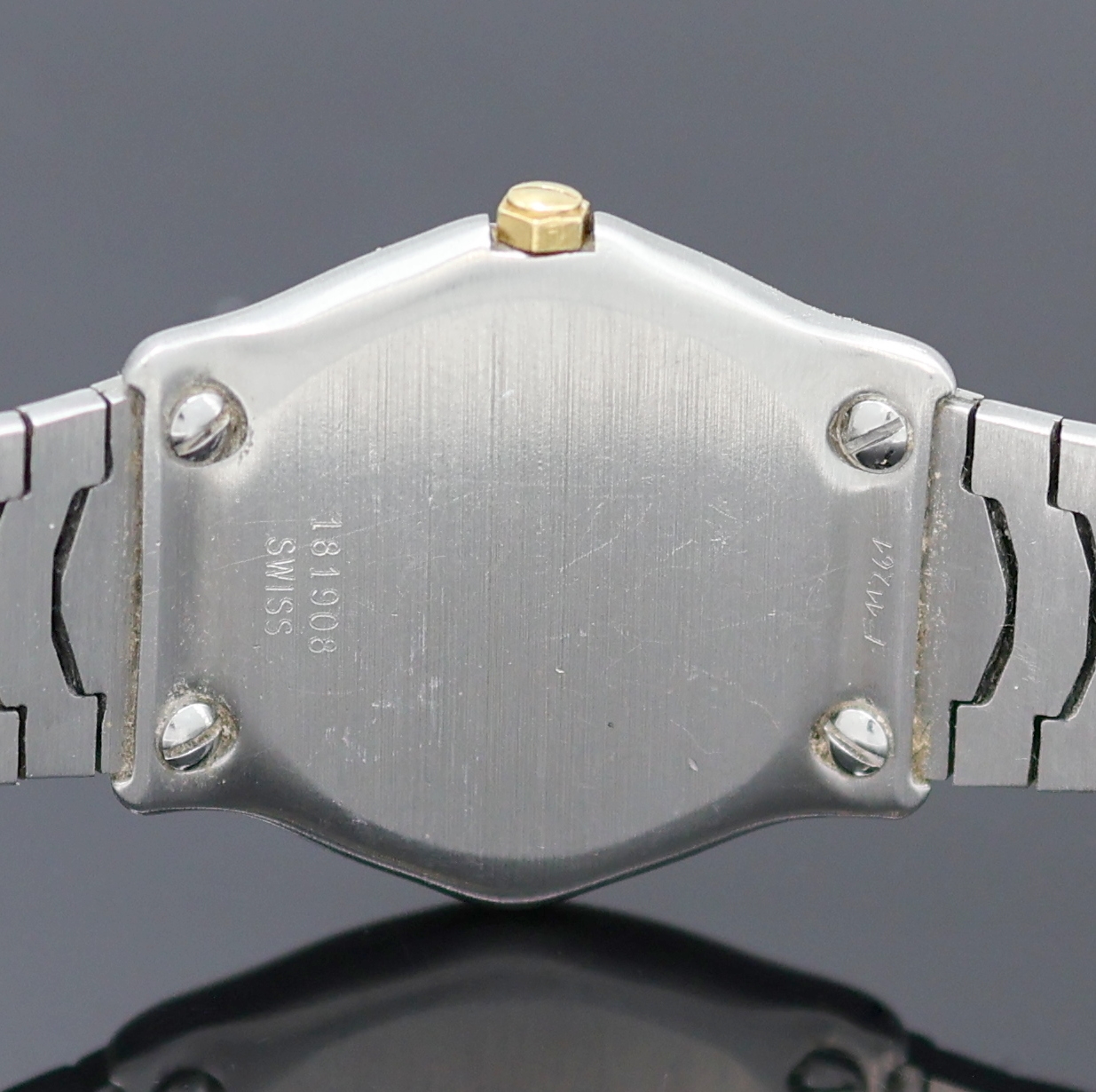 Detail e: EBEL Damenarmbanduhr, Schweiz um 1990, Edelstahl/Gold kombiniert inkl. Wellengliederband m. Kastenschloß, quarz, Lünette gegen Geh. 5-fach ...