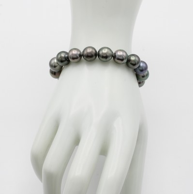 26984219a - Elastisches Tahitizuchtperlenarmband, dunkelgraue, l. barocke Perlen ca. 10.5-11 mm ...