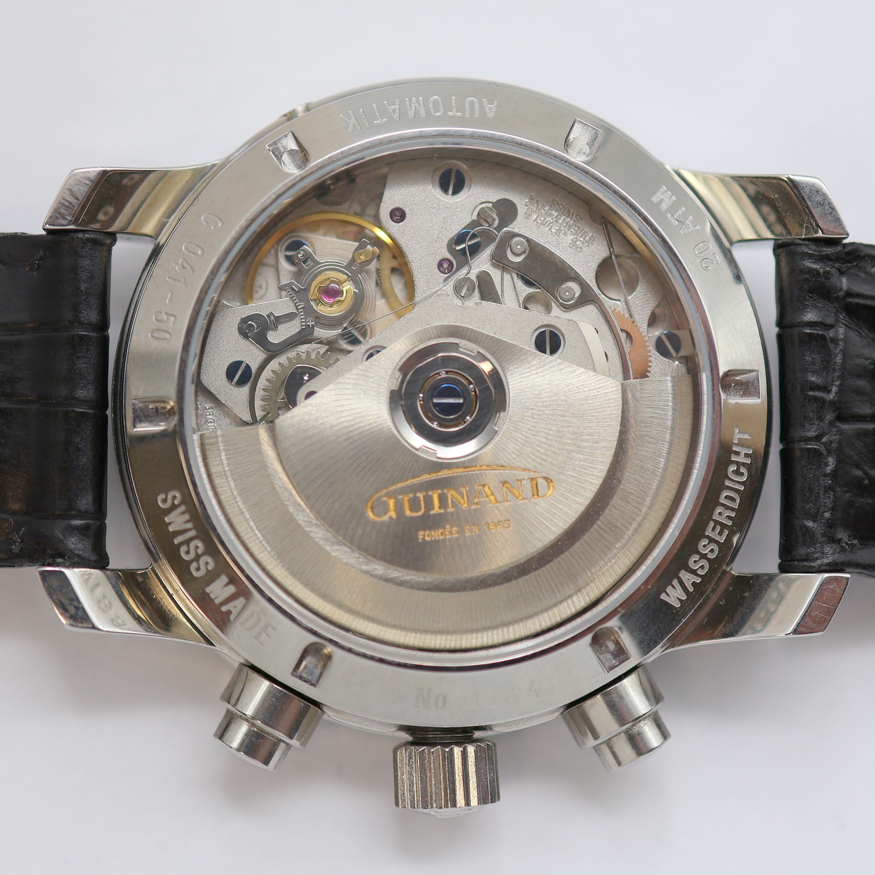 Detail g: GUINAND Armbandchronograph mit Vollkalender, Schweiz um 2005, Automatik, beids. vergl. Edelstahlgeh., Boden u. Krone verschr., Korrekturdr. für Tag ...