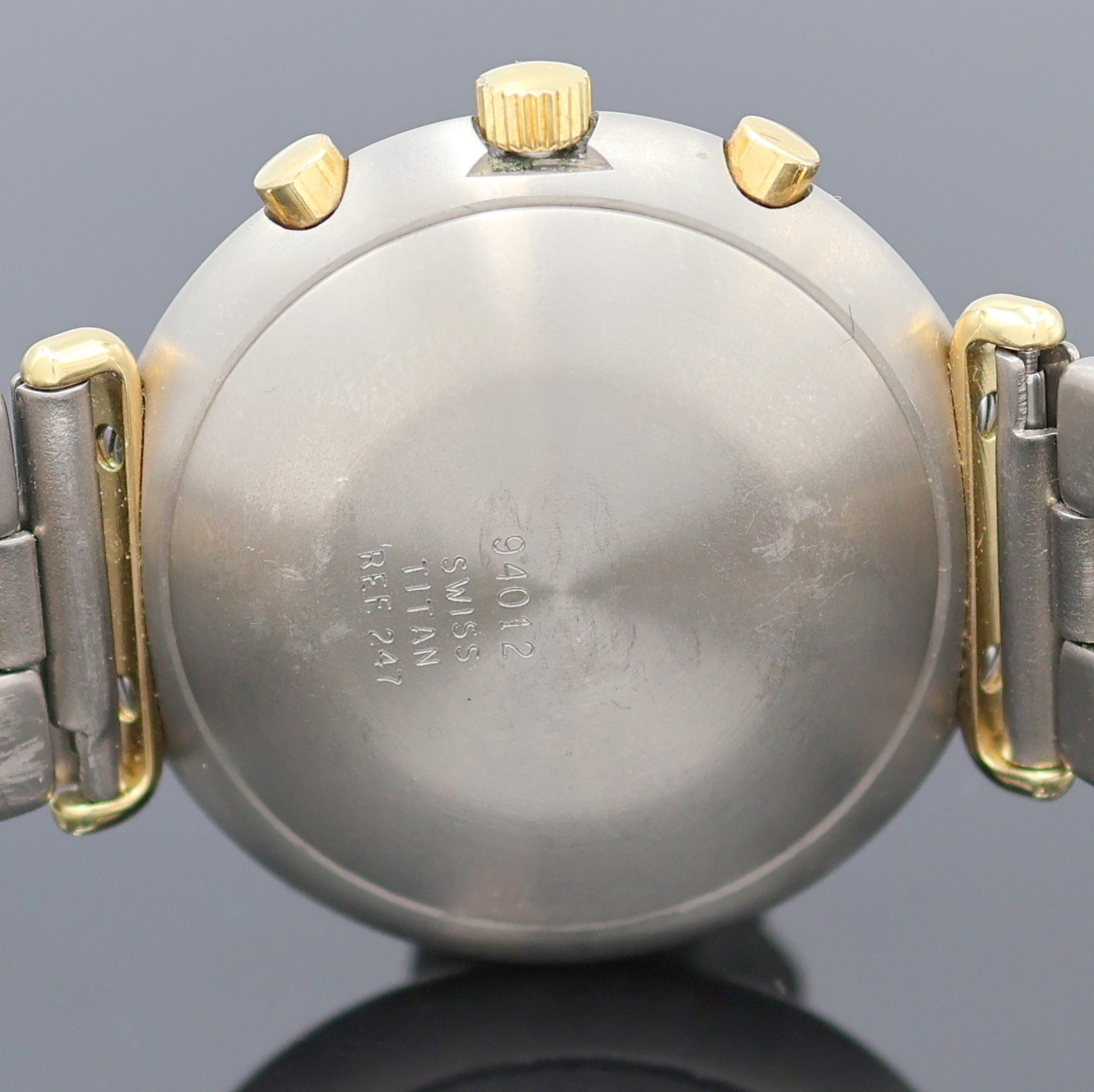 Detail e: SINN Armbandchronograph mit Mondphase Referenz 247, Schweiz um 1980, Automatik, Titangeh. inkl. orig. Gliederband m. Faltschl., Boden gedr., ...