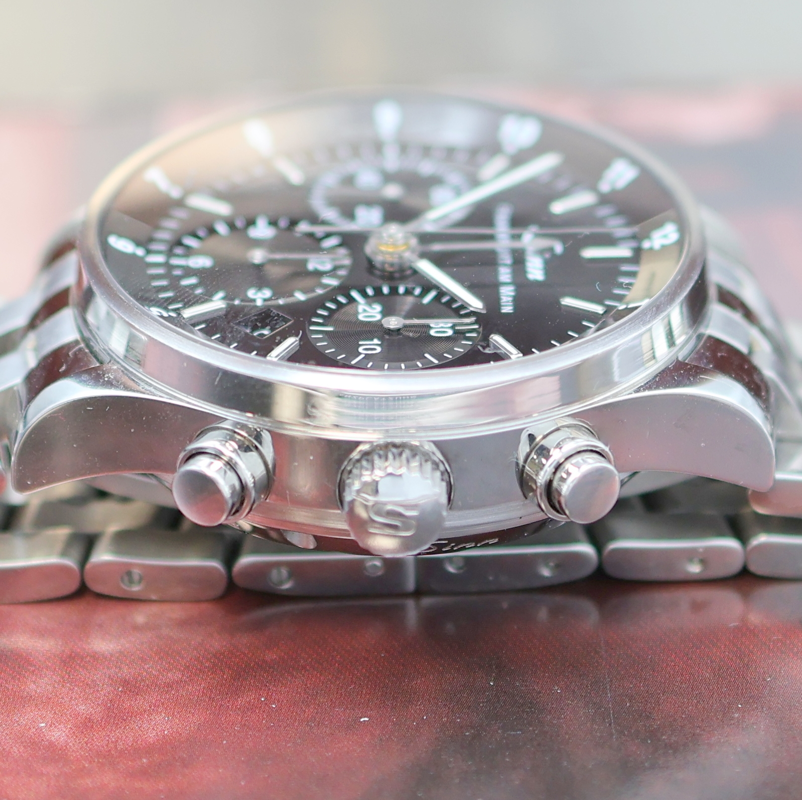 Detail c: SINN Herrenchronograph "Die Finanzplatzuhr" Referenz 6000, Deutschland um 2005, Automatik, Edelstahlgeh. inkl. Gliederband m. dopp. ...