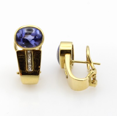 26984302a - Paar Ohrstecker mit Tansaniten und Diamanten, GG 750/000, Halbcreolen, ovale, fac. ...